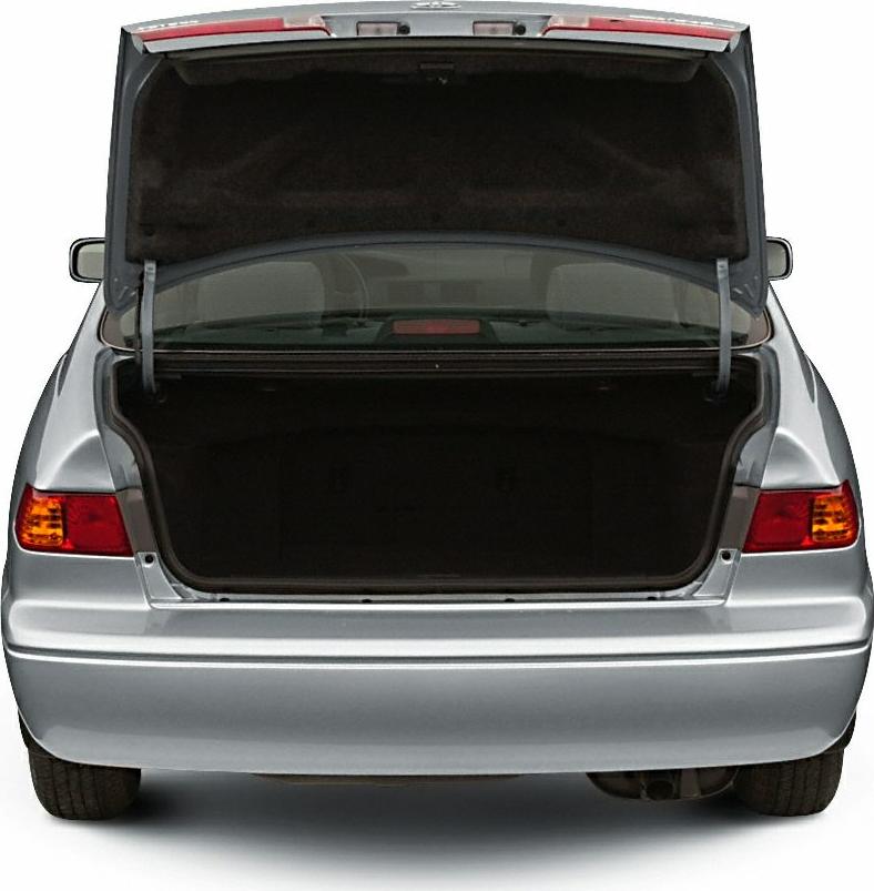 Open sedan trunk with visible interior and taillights