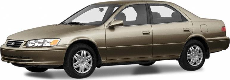 Side view of mid-size four-door sedan with beige color and steel wheels