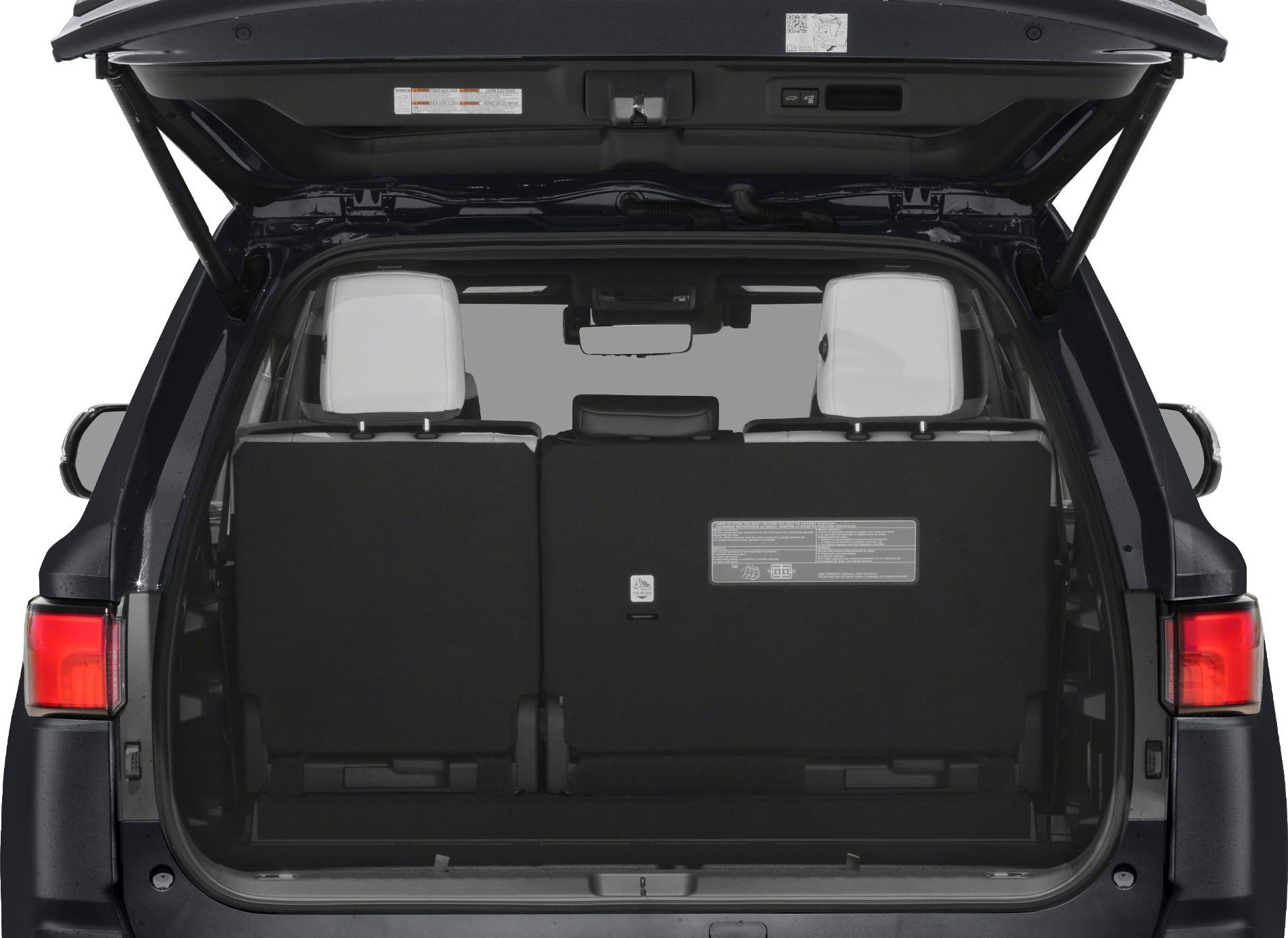 Open rear cargo space with visible rear seats and liftgate