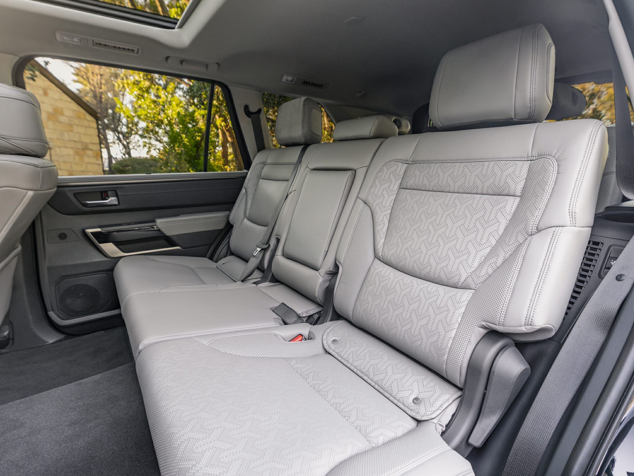 Spacious rear seat interior with premium leather upholstery and headrests