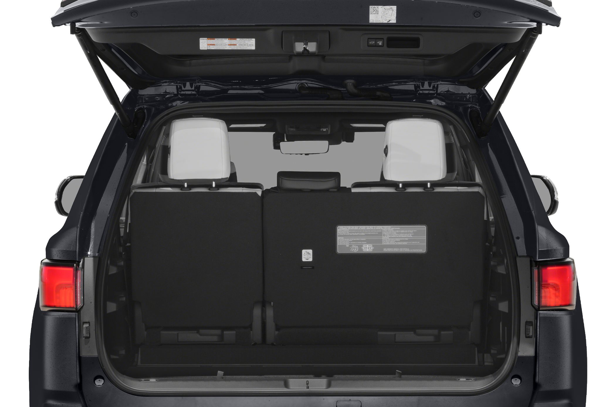 Rear cargo area with open tailgate and visible folded rear seats