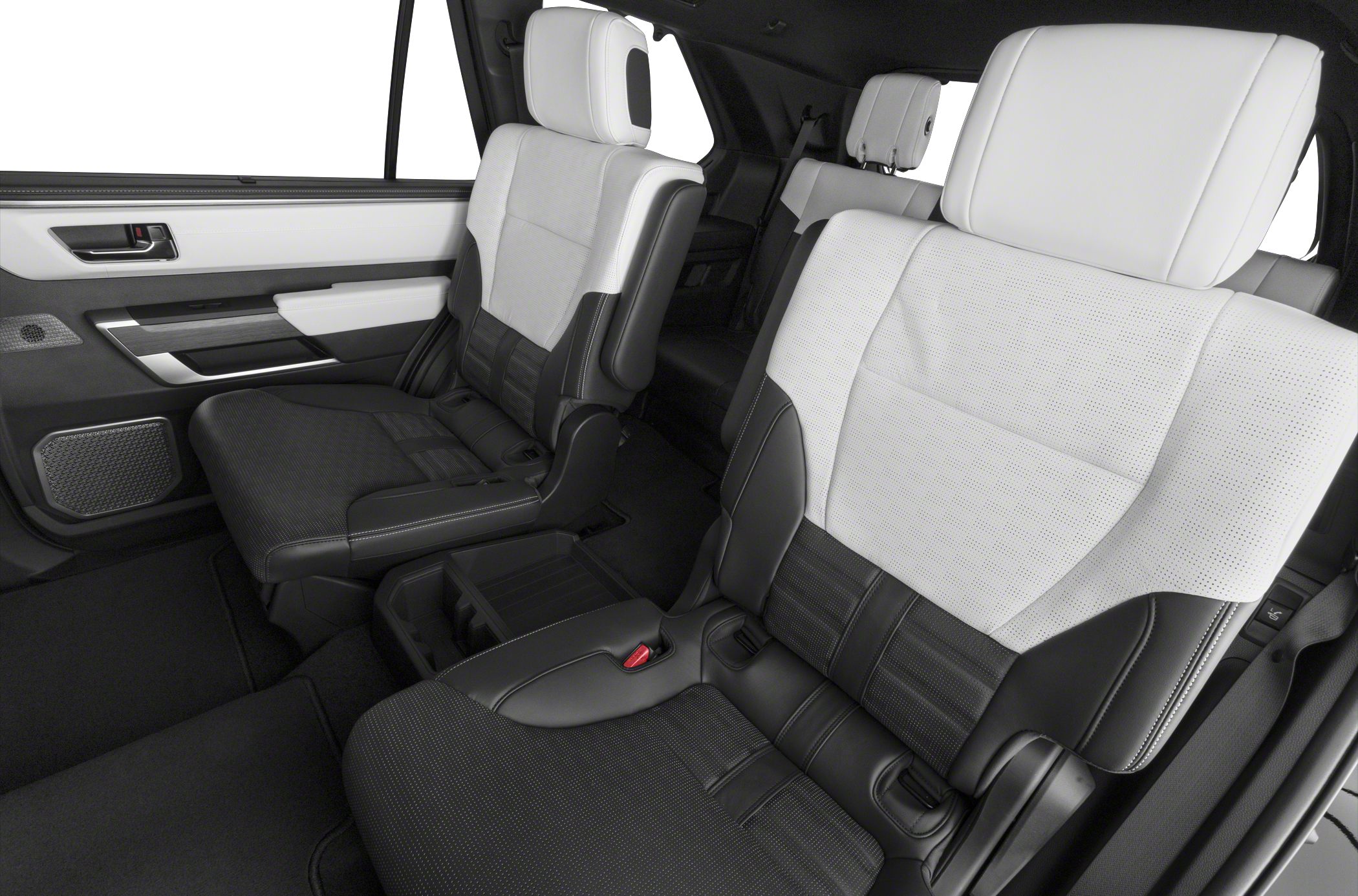 Rear seats with black and white dual-tone perforated leather upholstery