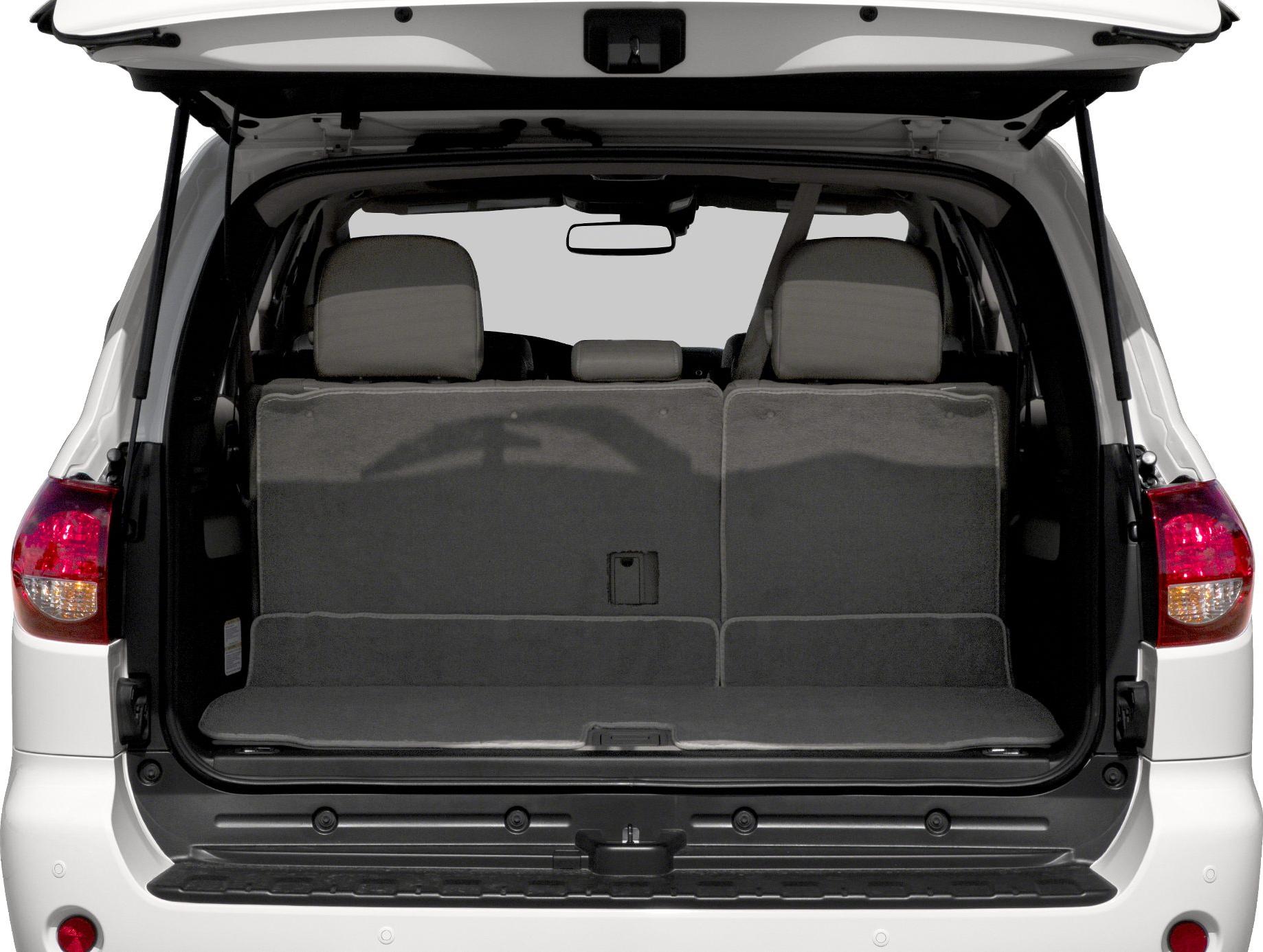 SUV rear cargo area with open tailgate and visible folded back seats