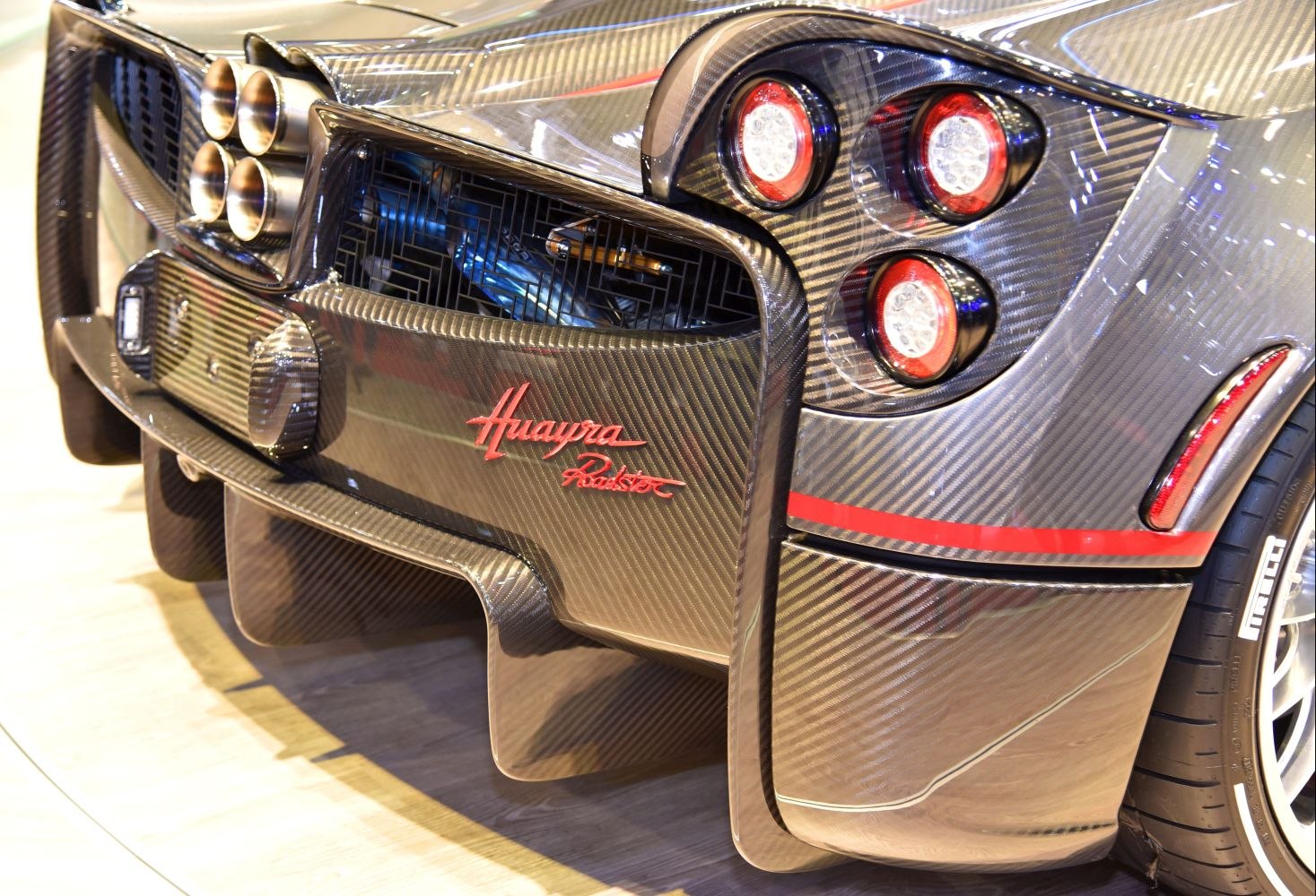 Rear carbon fiber body with quad exhaust and circular tail lights