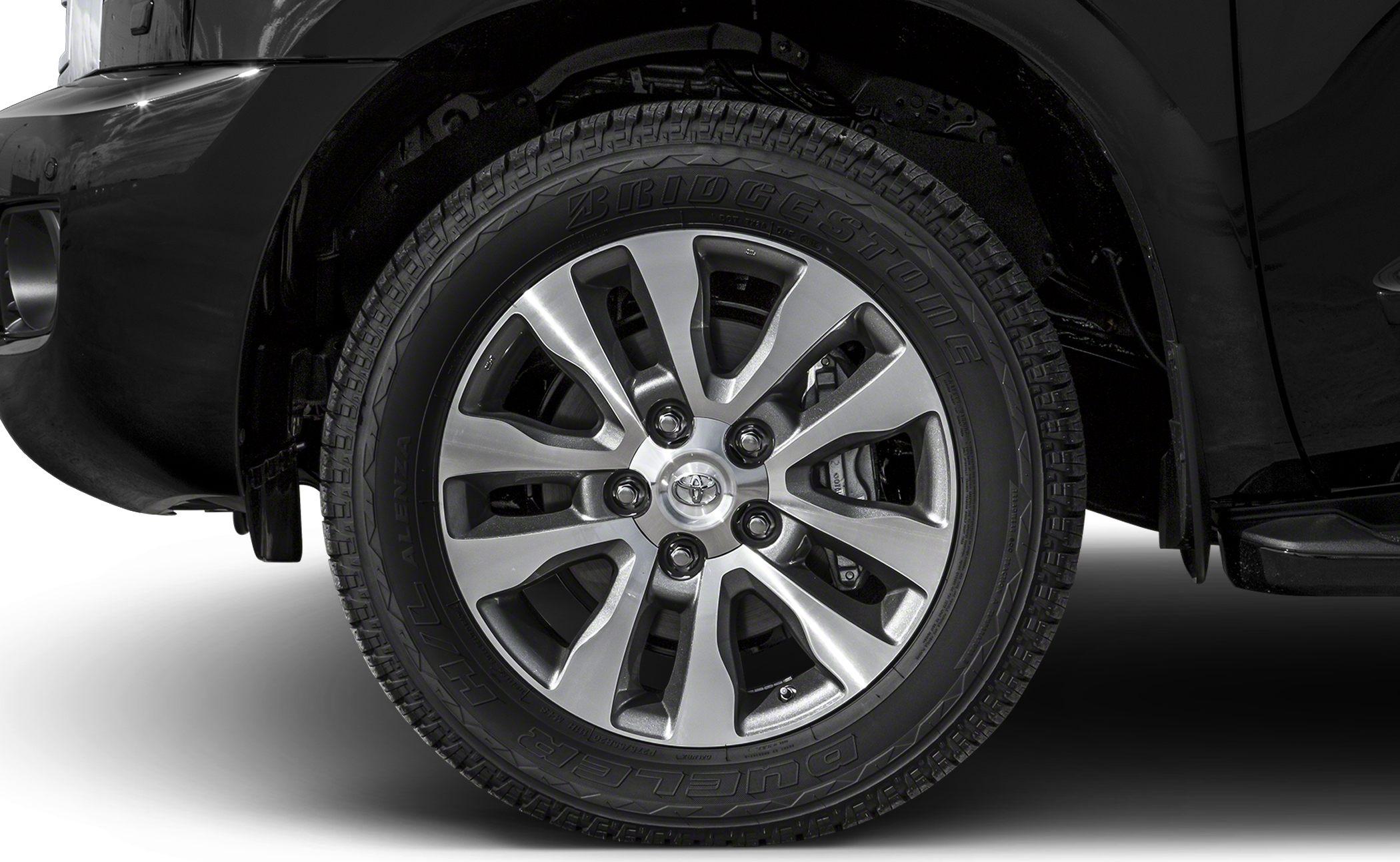 Close-up of alloy wheel and Bridgestone tire tread