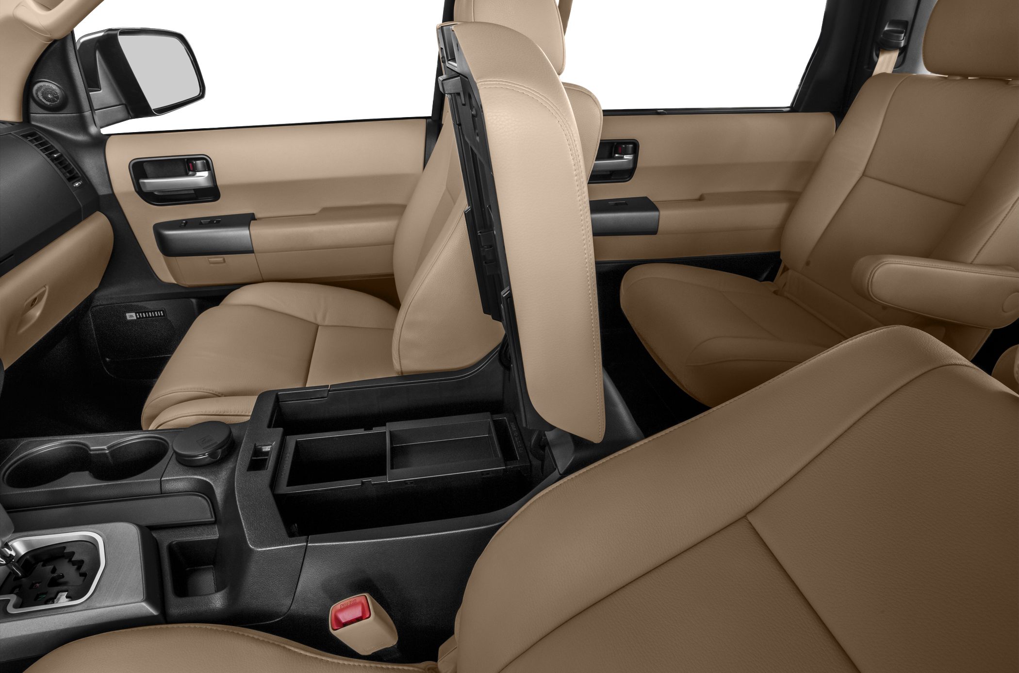Beige leather seats and open center console with storage compartment