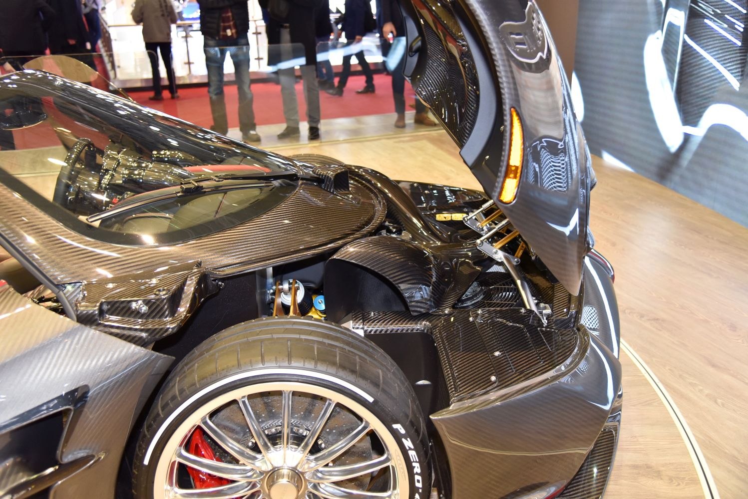 Rear suspension and carbon fiber bodywork with open engine cover