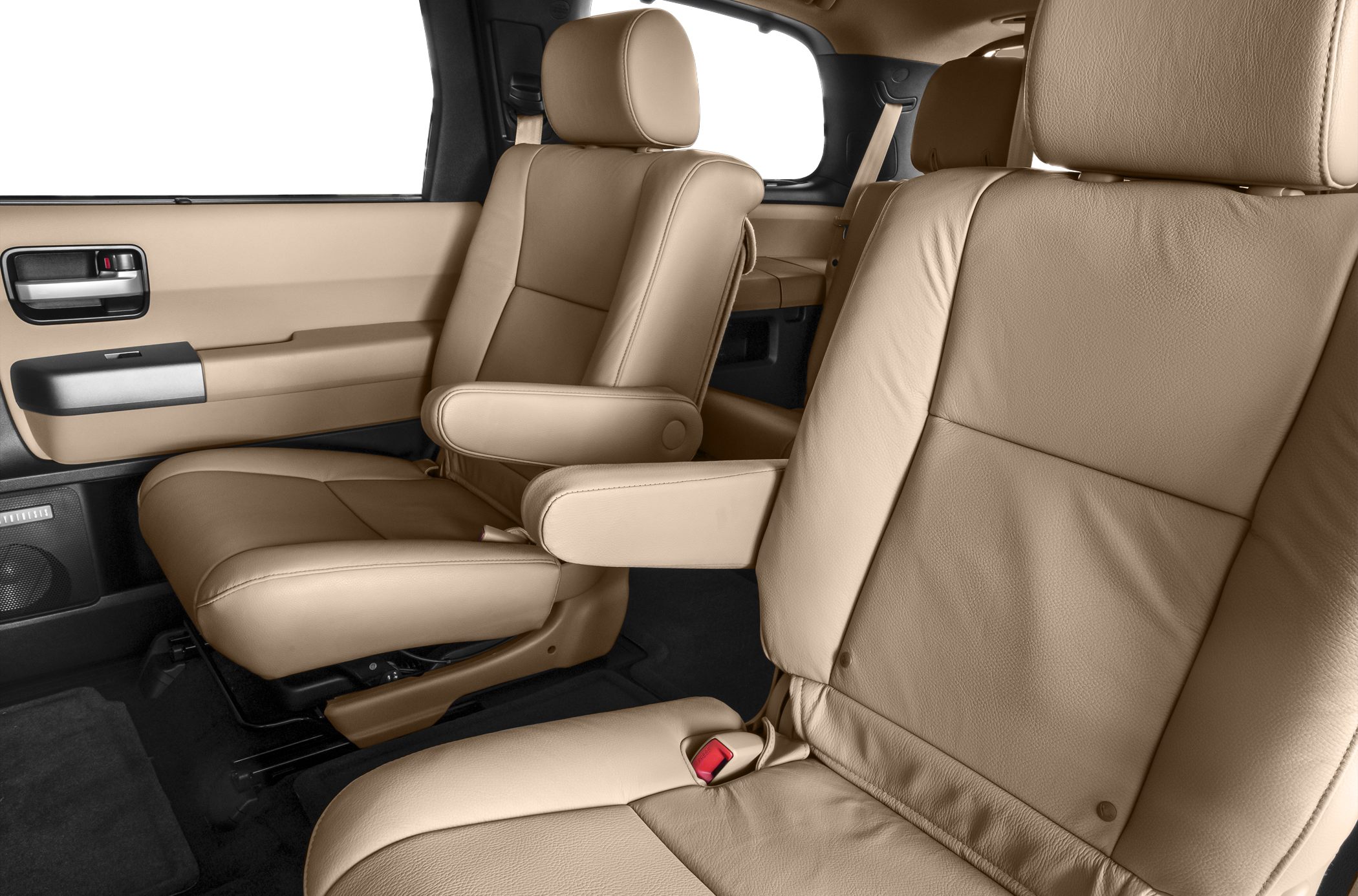 Beige leather interior seats with armrests and seatbelt