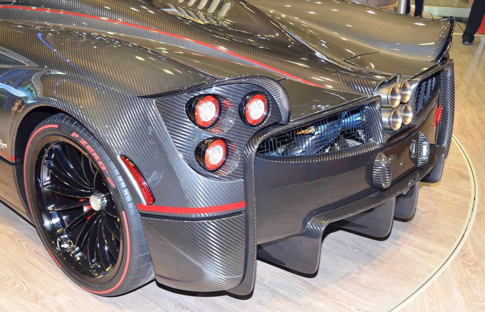 Carbon fiber rear end with quad exhaust and round taillights.