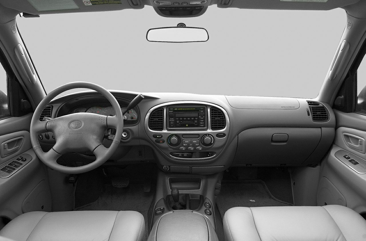 Dashboard, steering wheel, center console view inside vehicle