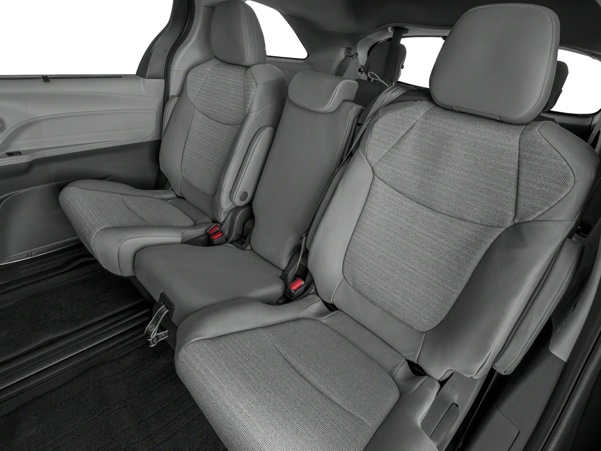 Rear row spacious seating with integrated armrests and seat belts.