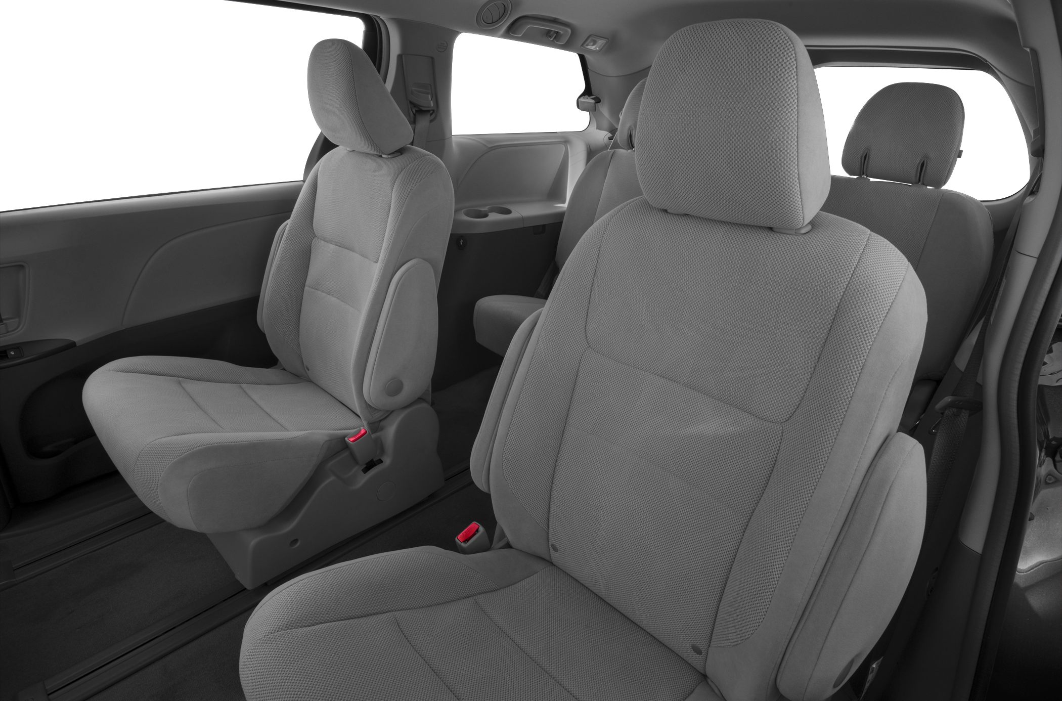 Spacious minivan interior showing fabric captain seats.
