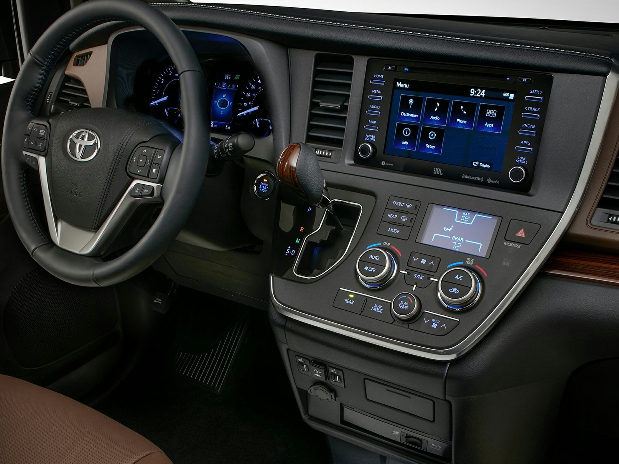 Dashboard, infotainment screen, steering wheel, climate control panel