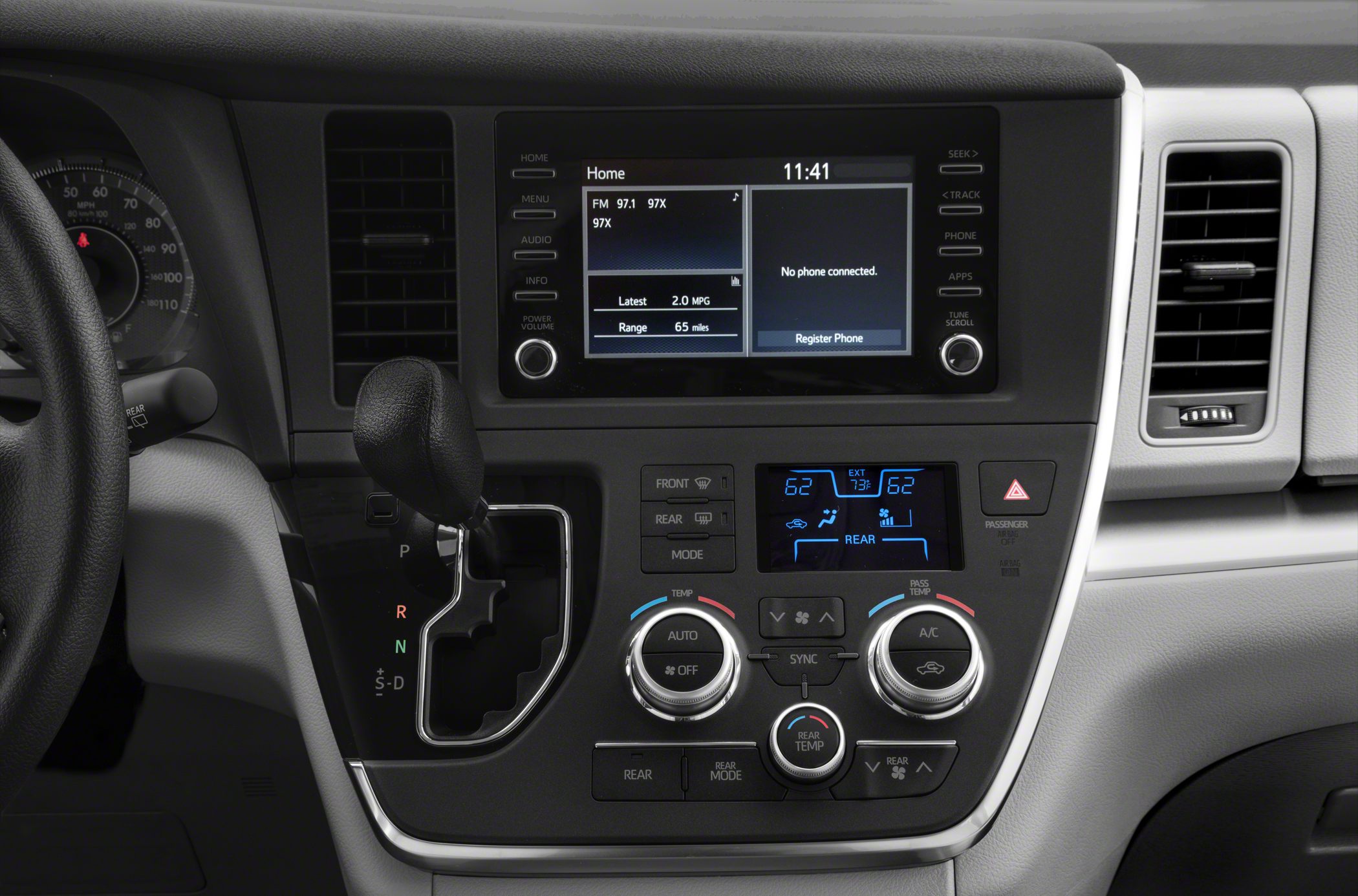 Infotainment screen and climate control panel with gear shifter