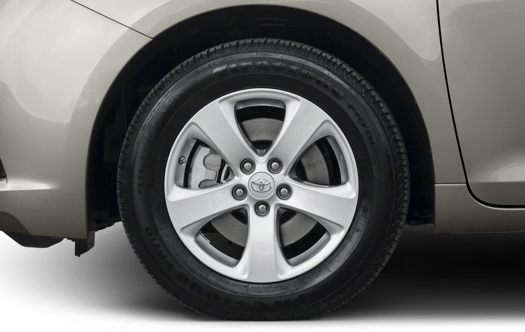 Close-up of alloy wheel and tire with brake disc