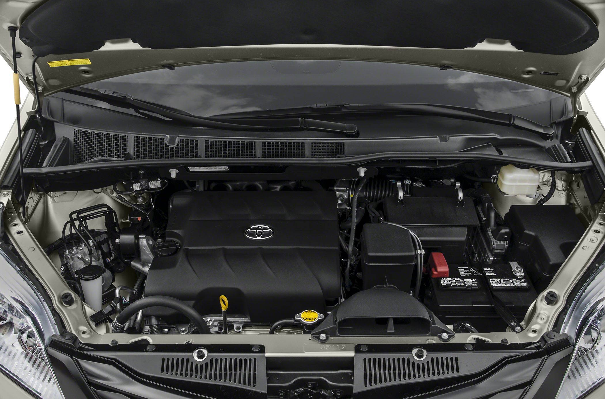 Clean and organized engine compartment with visible components under hood