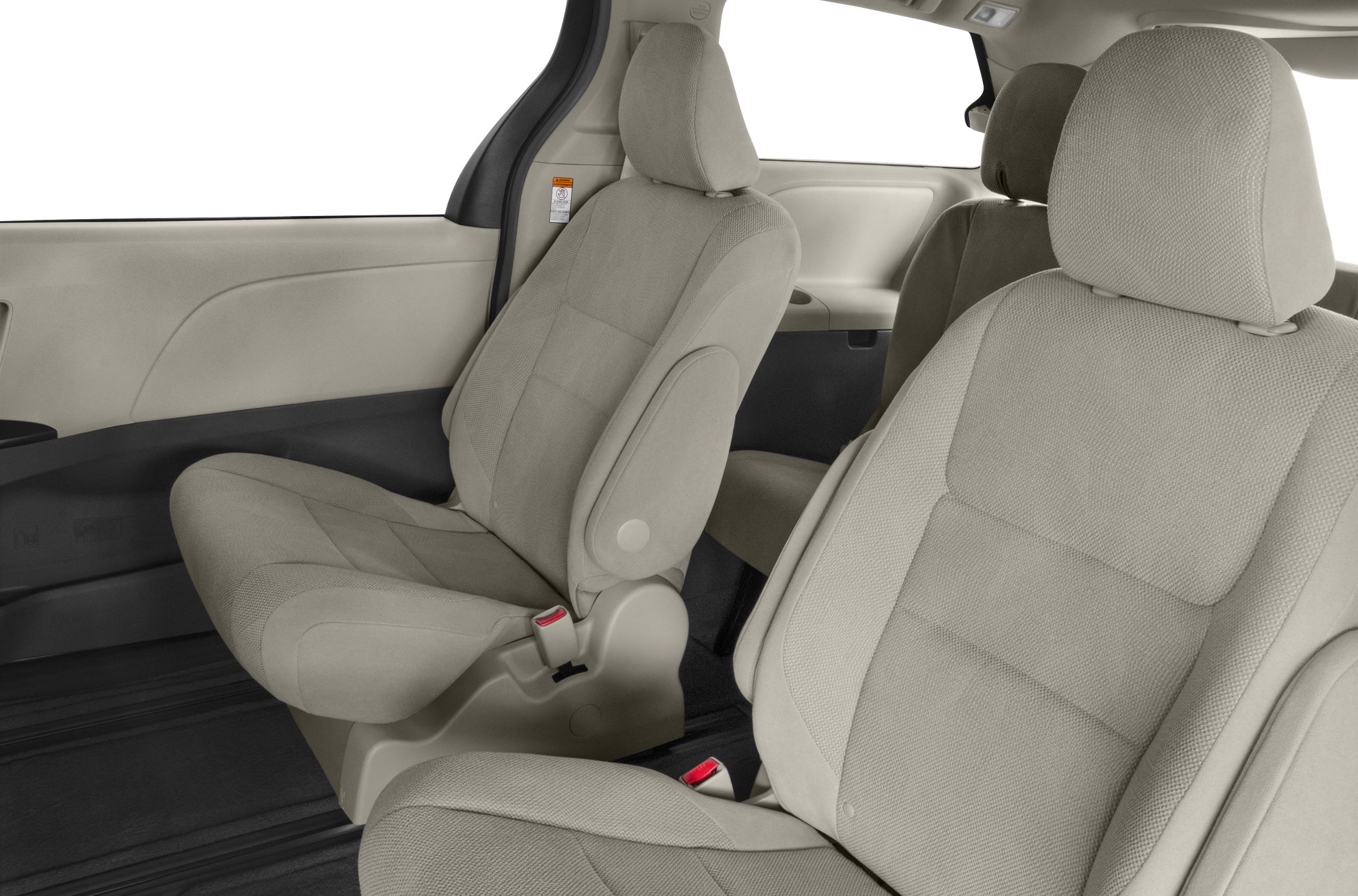 Beige fabric interior seats of a spacious minivan cabin