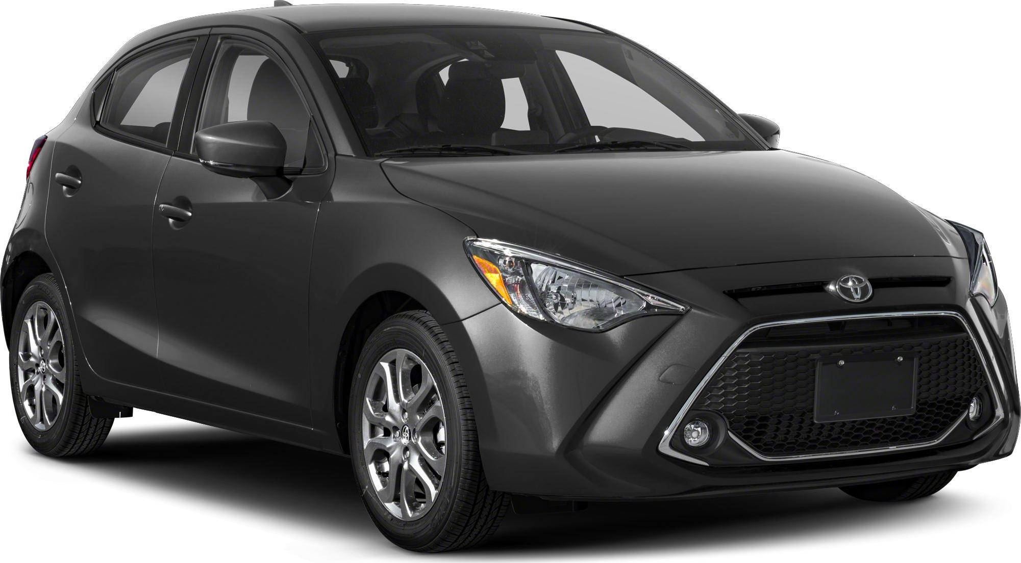 Front side view with modern headlights and large grille