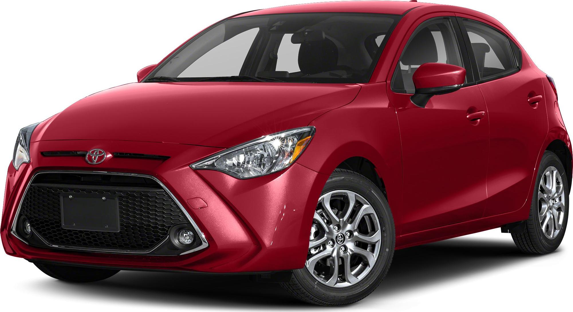 Front-side view with headlights, honeycomb grille and alloy wheels