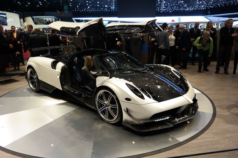 Butterfly doors and carbon fiber hood on supercar