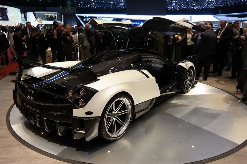 Gullwing doors and carbon fiber rear of a supercar