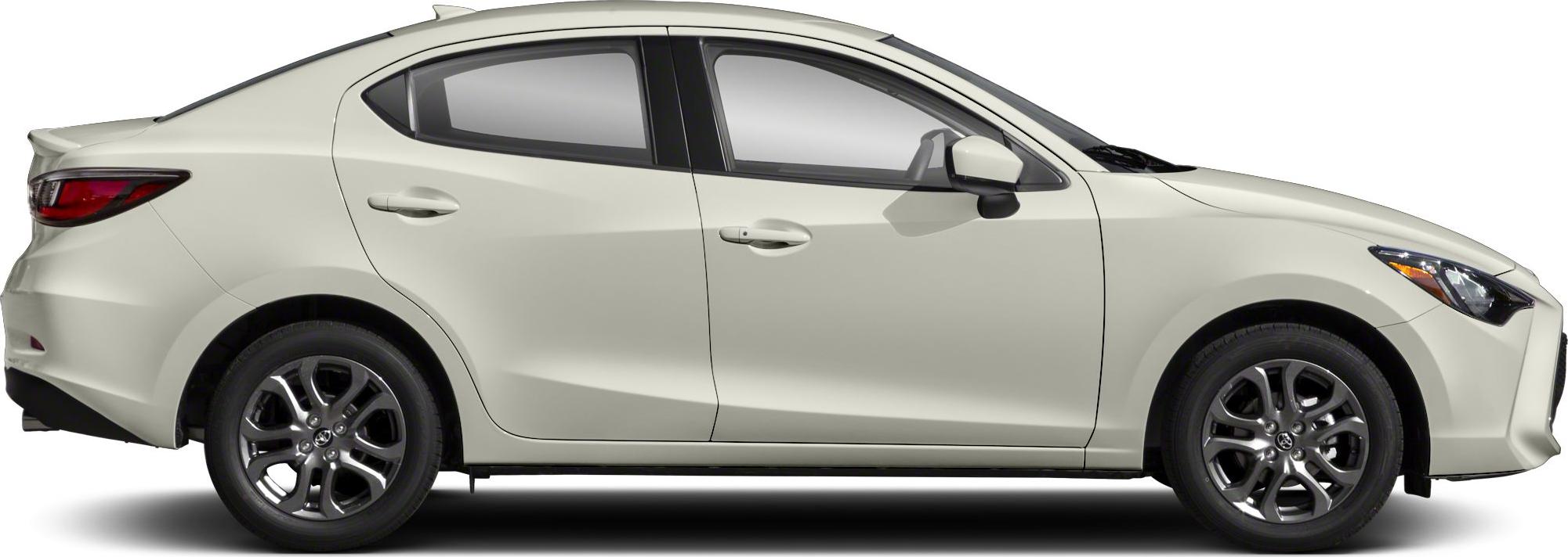 Side profile of a sleek sedan with alloy wheels.