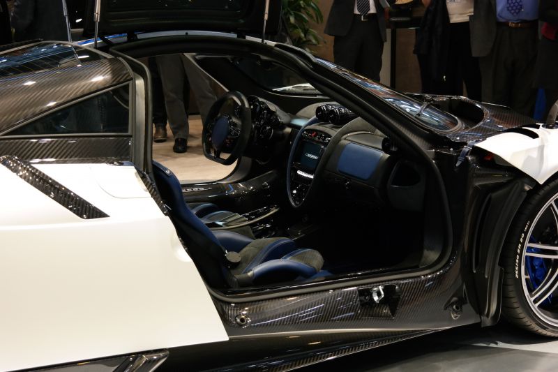 High-tech interior with carbon fiber elements and sporty seats.