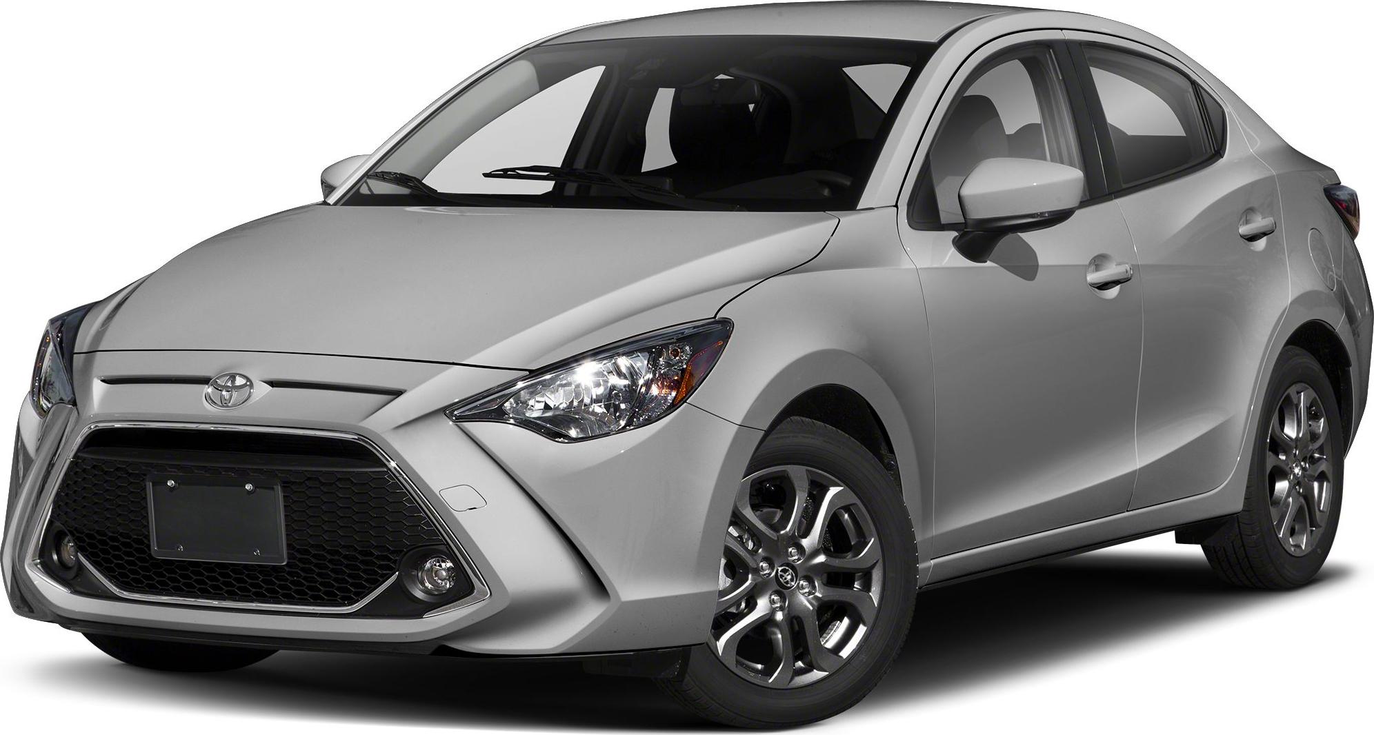 Large front grille and sleek headlights of compact sedan