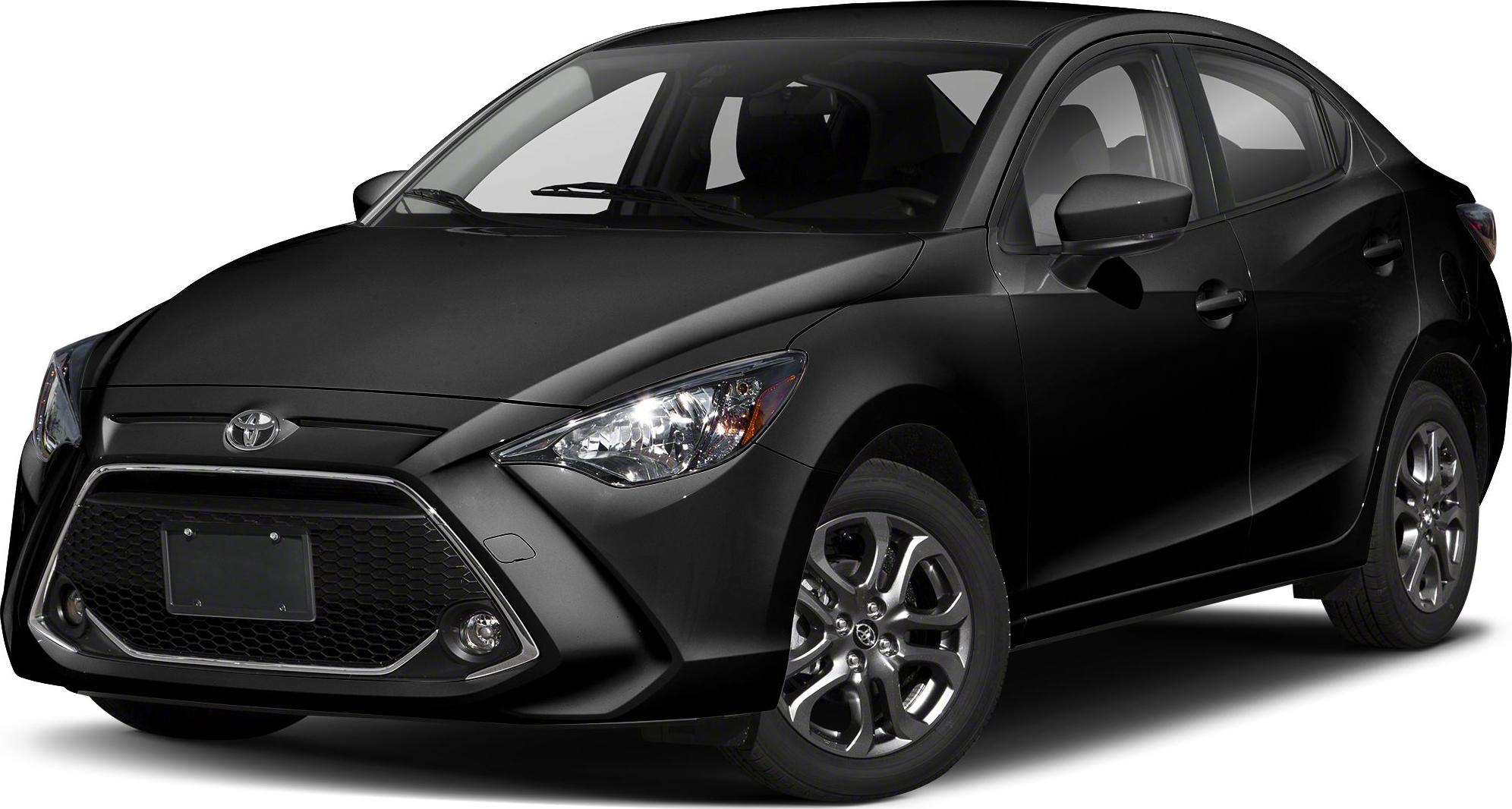 Front angle with large hexagonal grille, sleek headlights, fog lights, alloy wheels