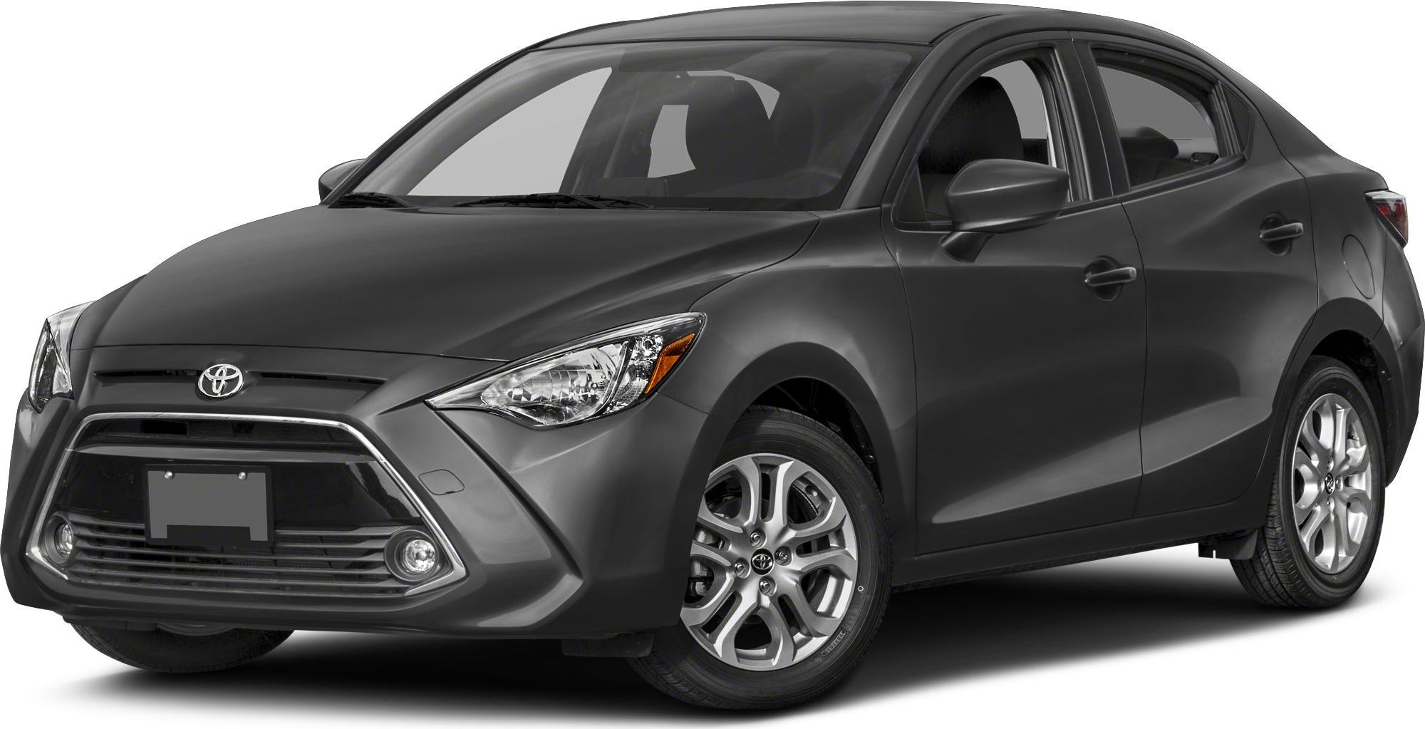 Front-side view of compact sedan with alloy wheels and dynamic design