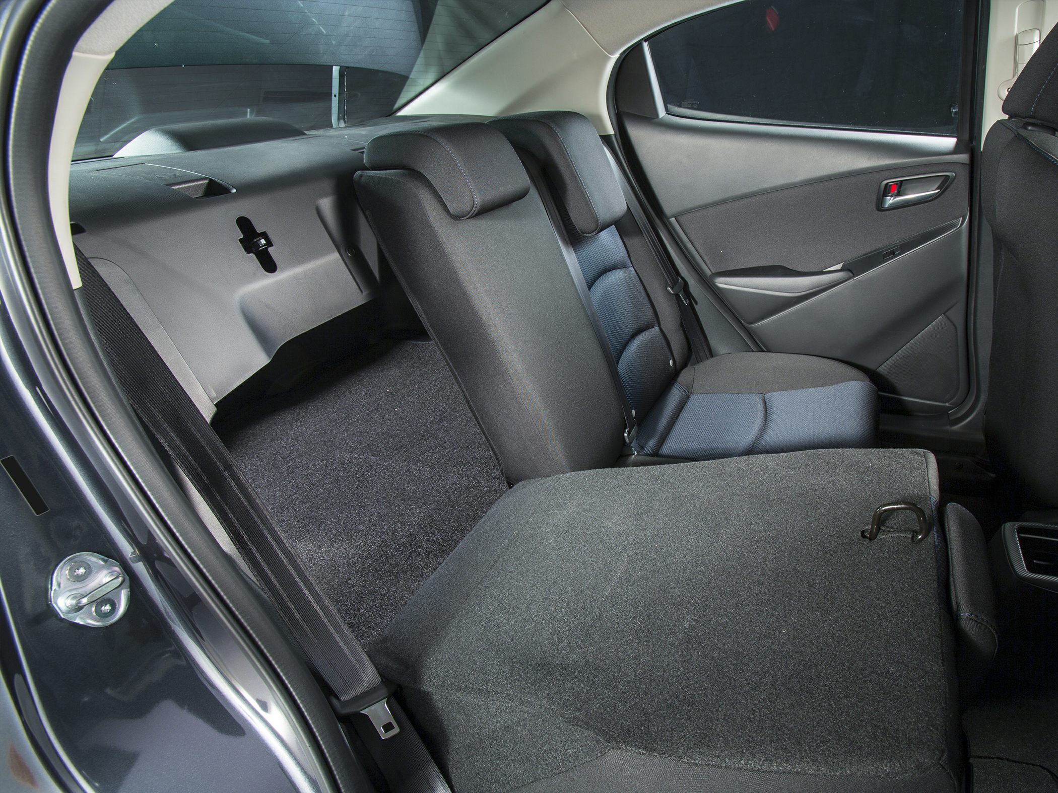 Rear seat fold-down showing flexible cargo space and interior design