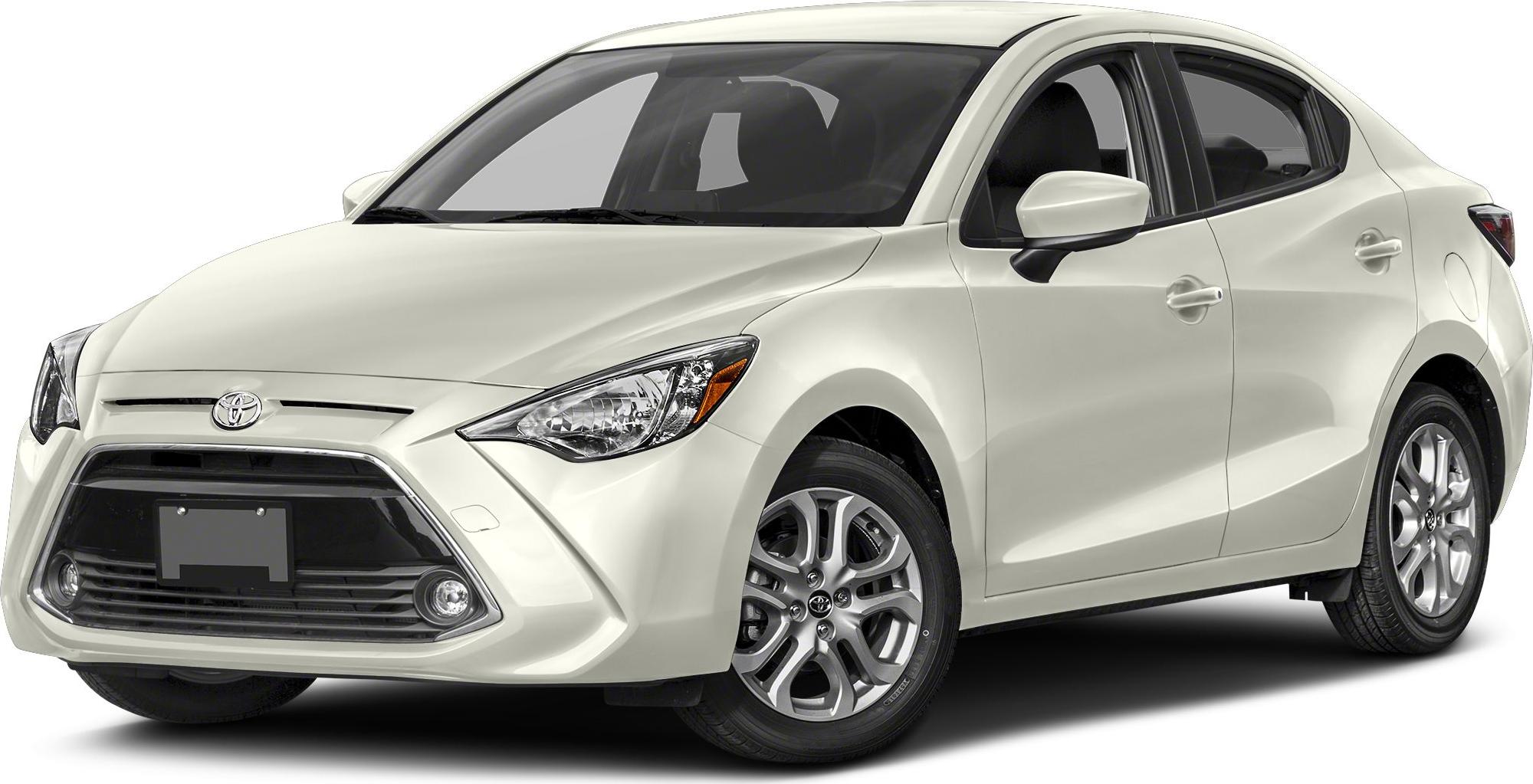 Front and side view of compact sedan with alloy wheels and sleek headlights
