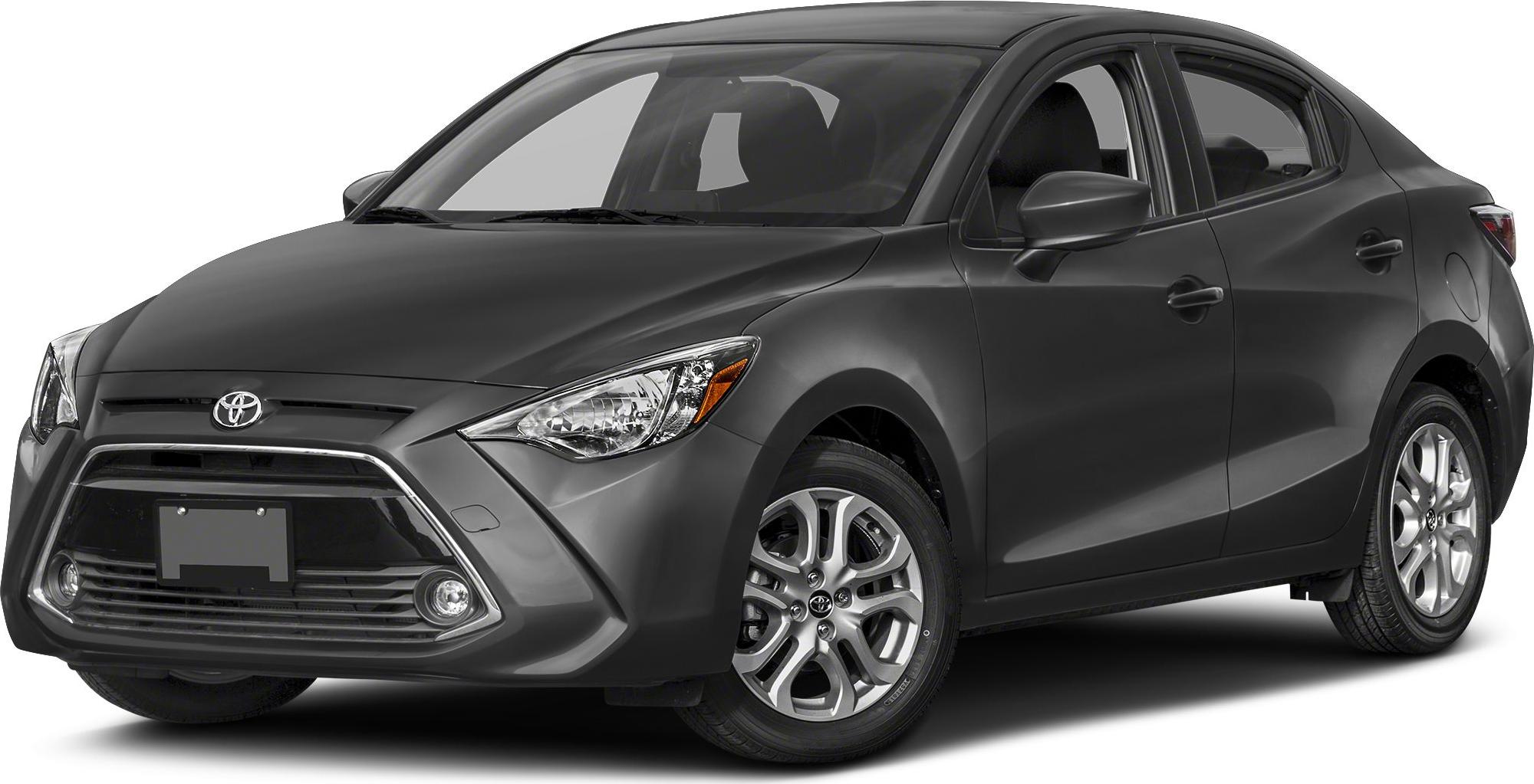 Compact sedan with trapezoidal front grille and alloy wheels