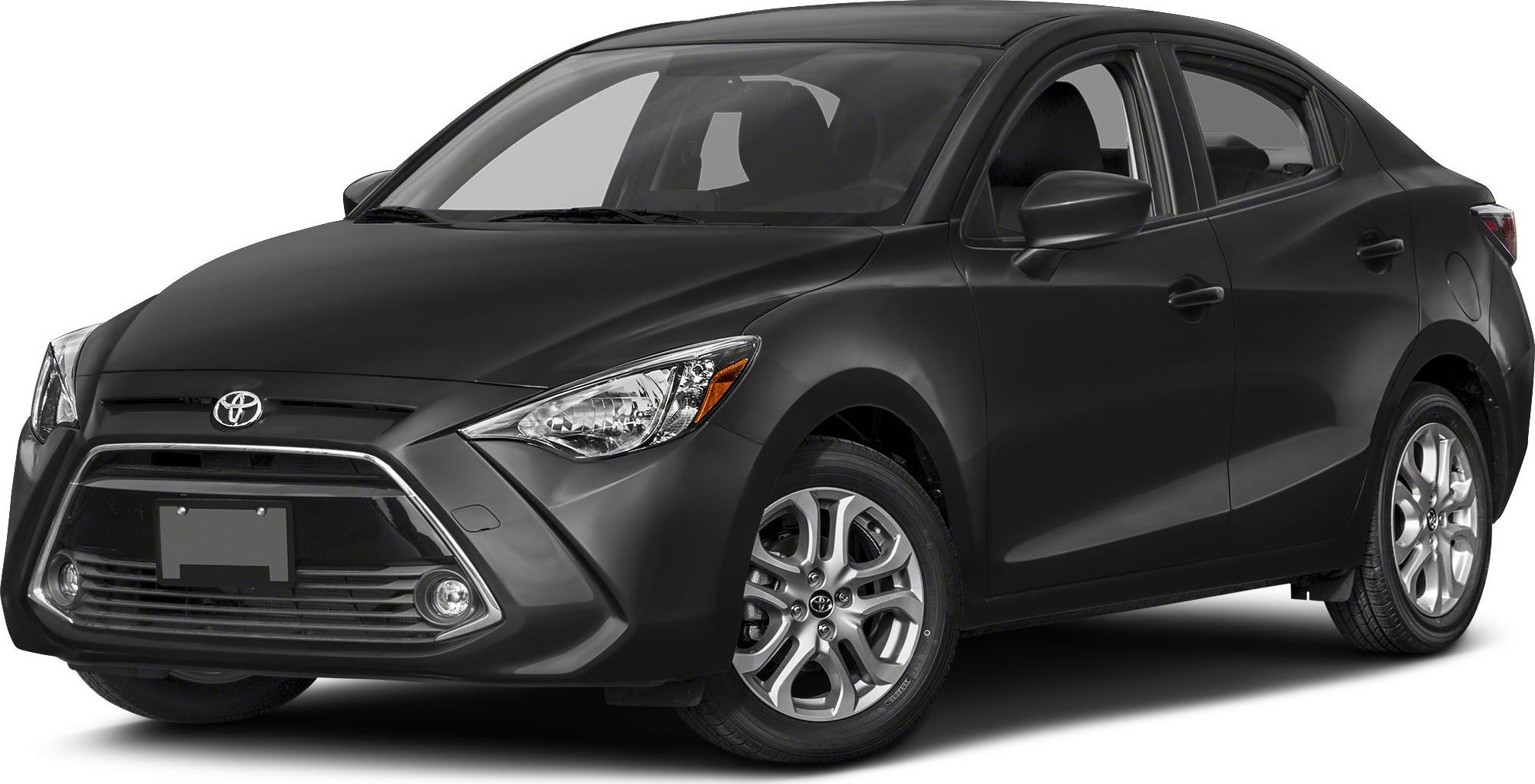 Black compact sedan with sharp headlights and distinct grille