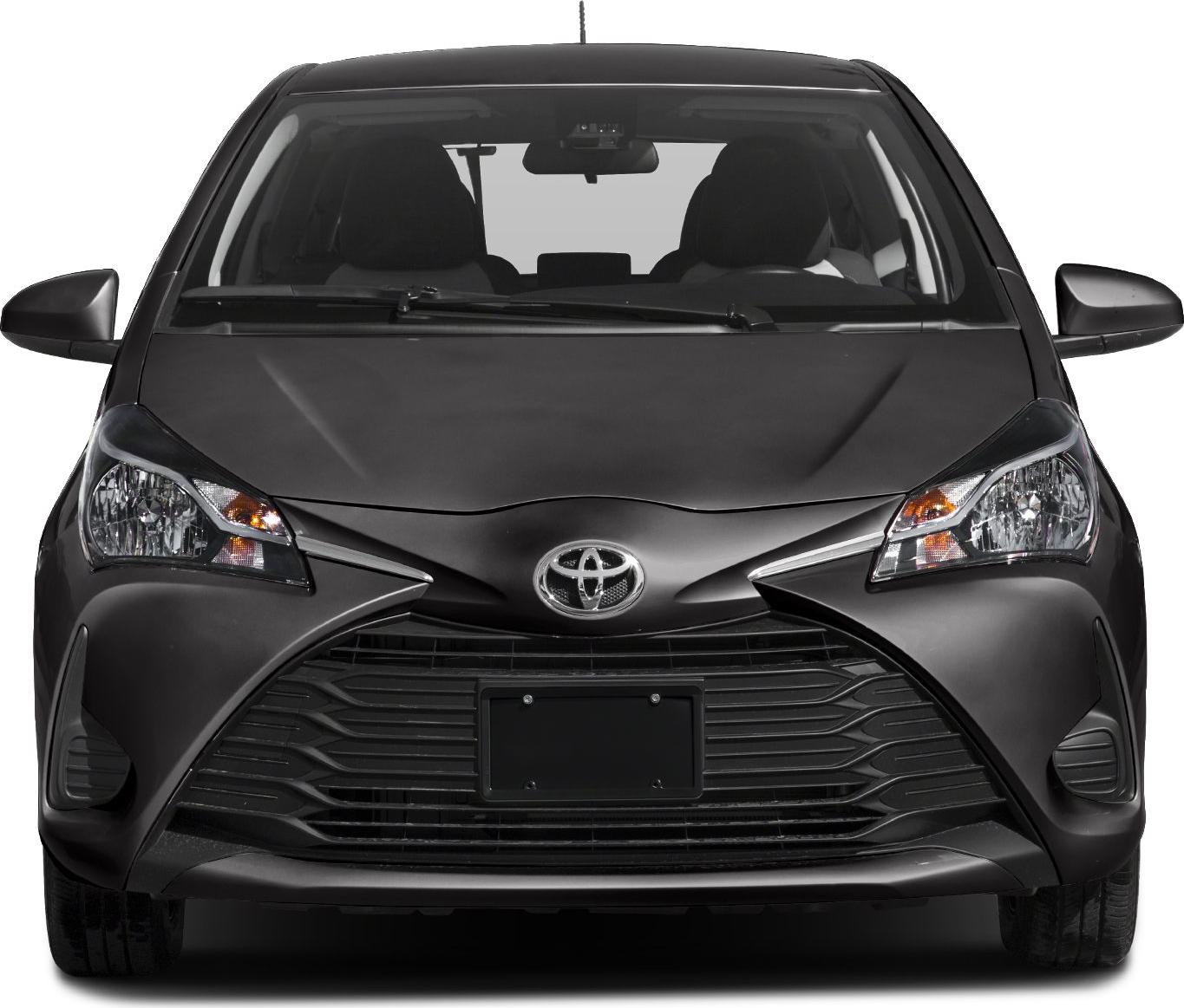 Front view with prominent grille and sharp headlights