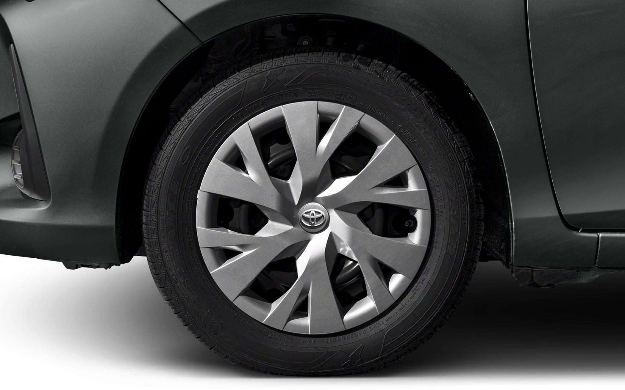 Alloy wheel with multi-spoke design and Goodyear tire on a vehicle.