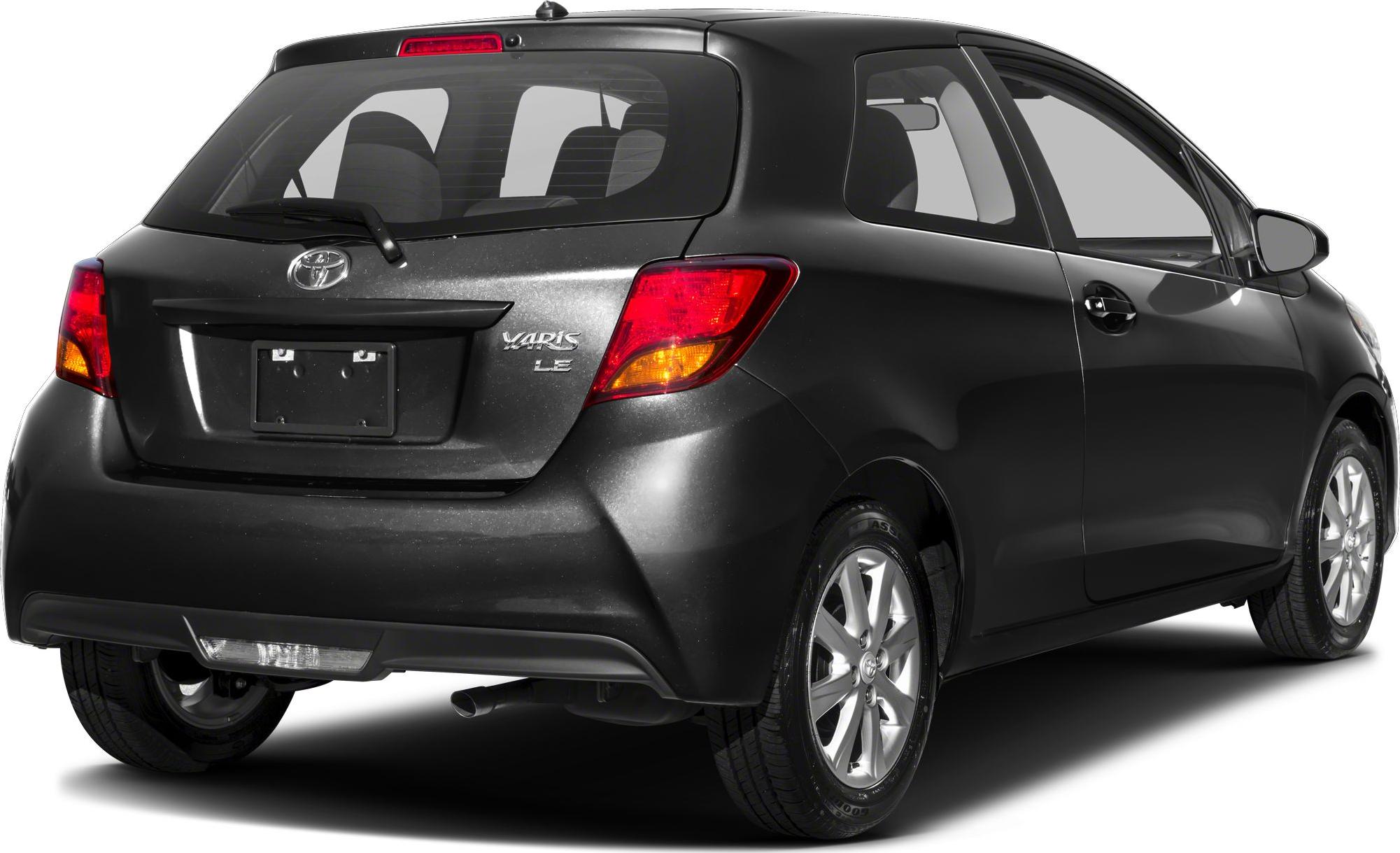 Rear view of compact hatchback with tail lights and rear windshield wiper