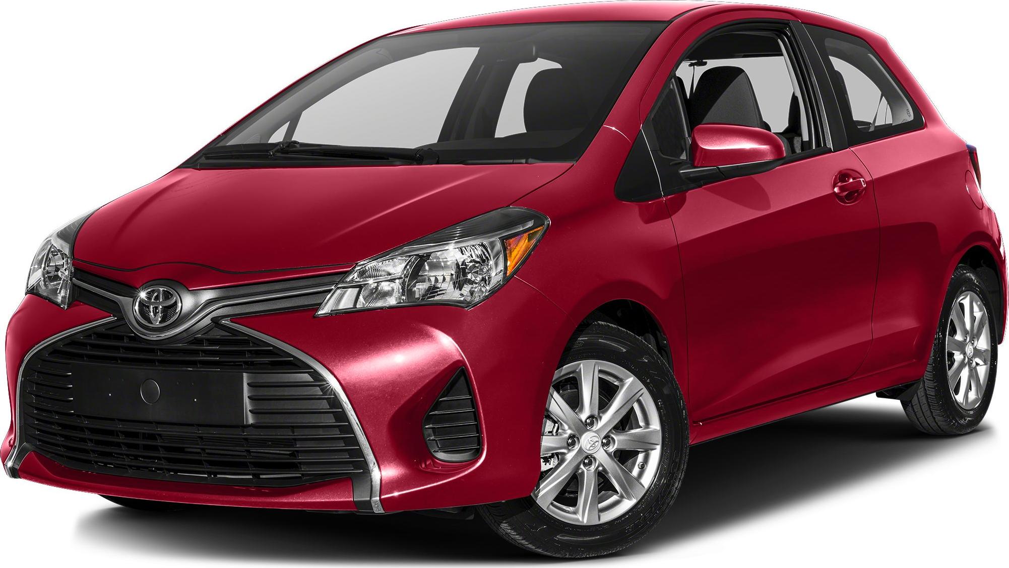 Red hatchback with distinct front grille and headlight design