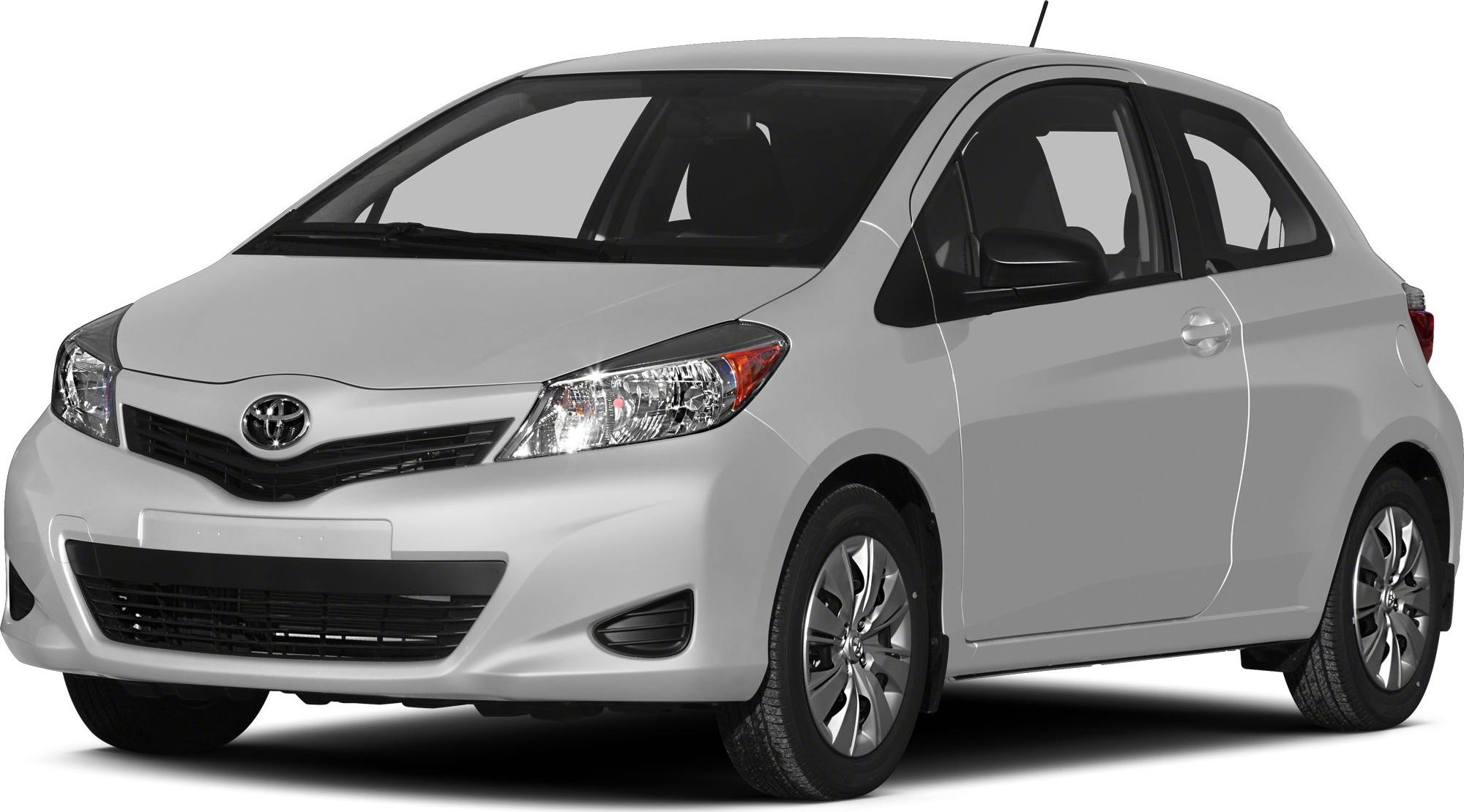 Compact hatchback with sleek headlights and black grille from front side.