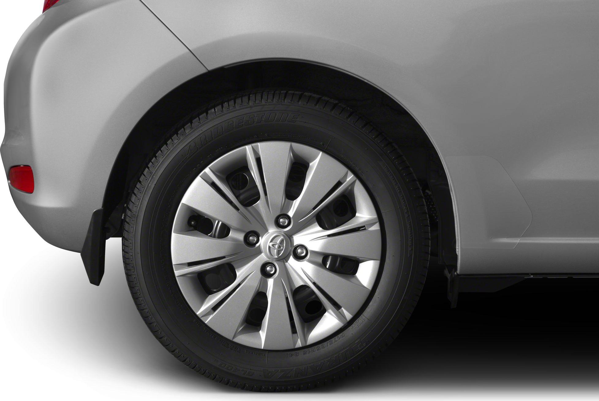 Close-up of alloy wheel and rear fender with rear light and mudguard.