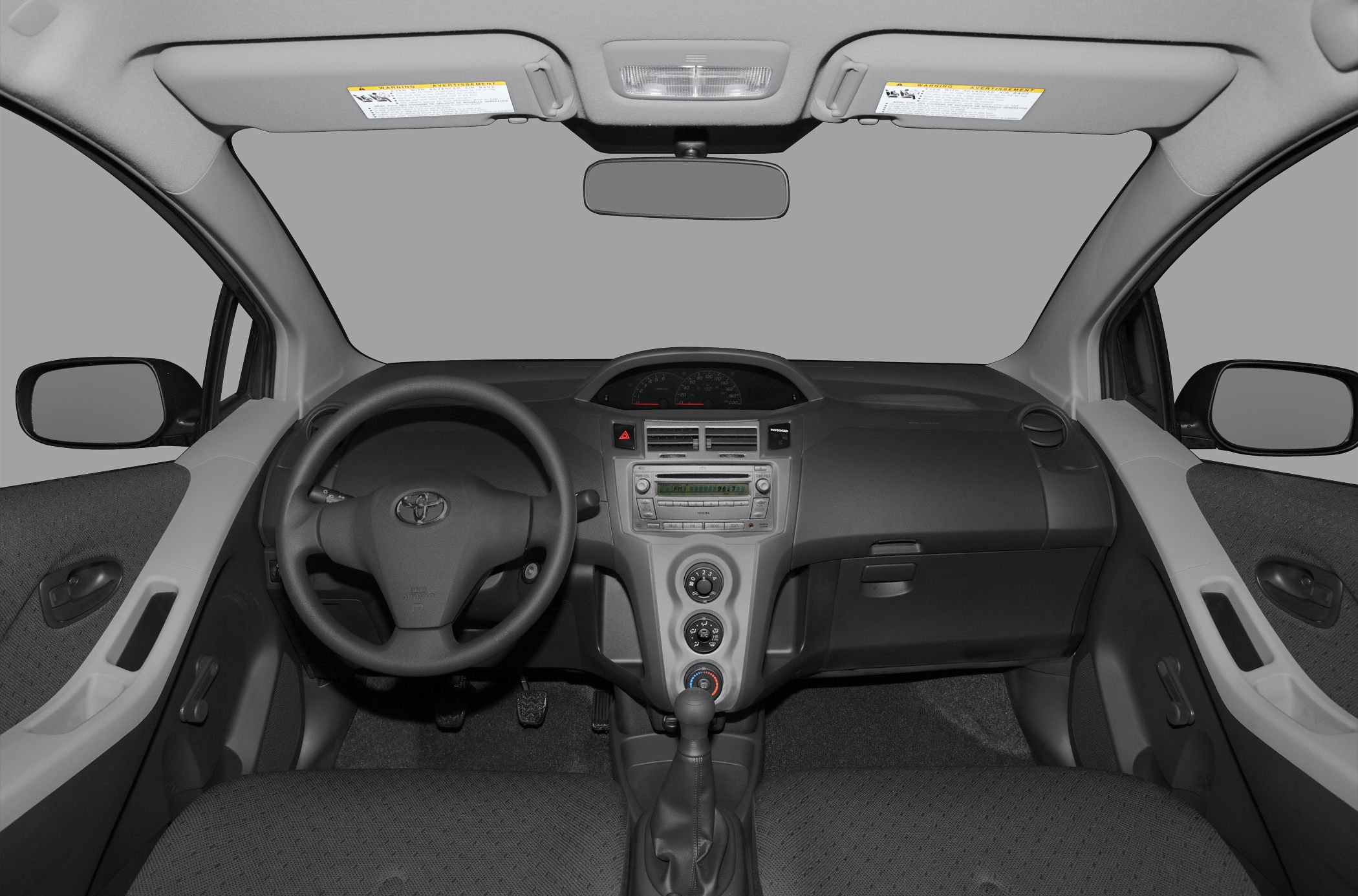 Dashboard, steering wheel, center console with manual gear shift
