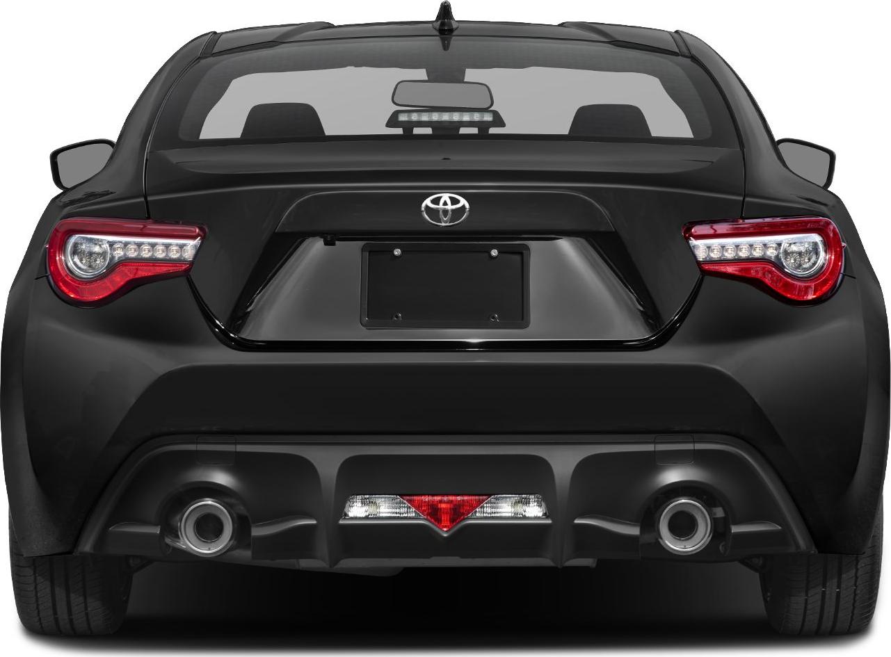 Sporty rear view with LED taillights and dual exhaust pipes.