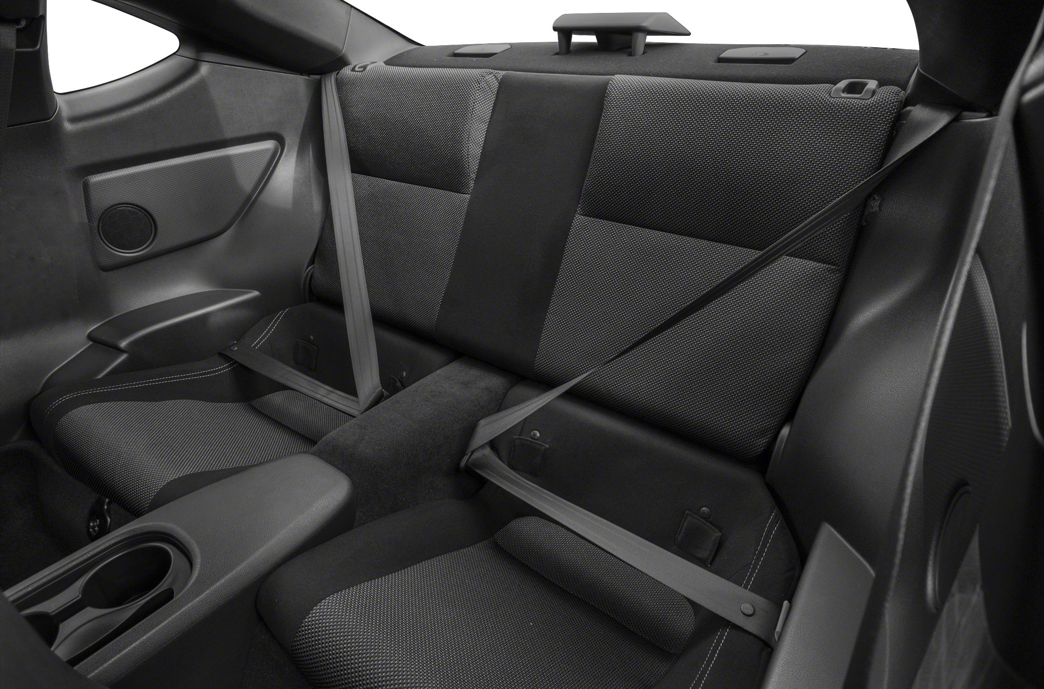 Rear passenger seats and center armrest with seat belts