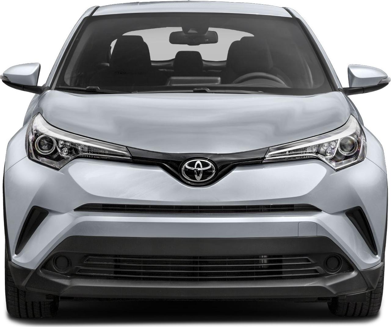 Symmetrical sleek headlights and grille with Toyota emblem