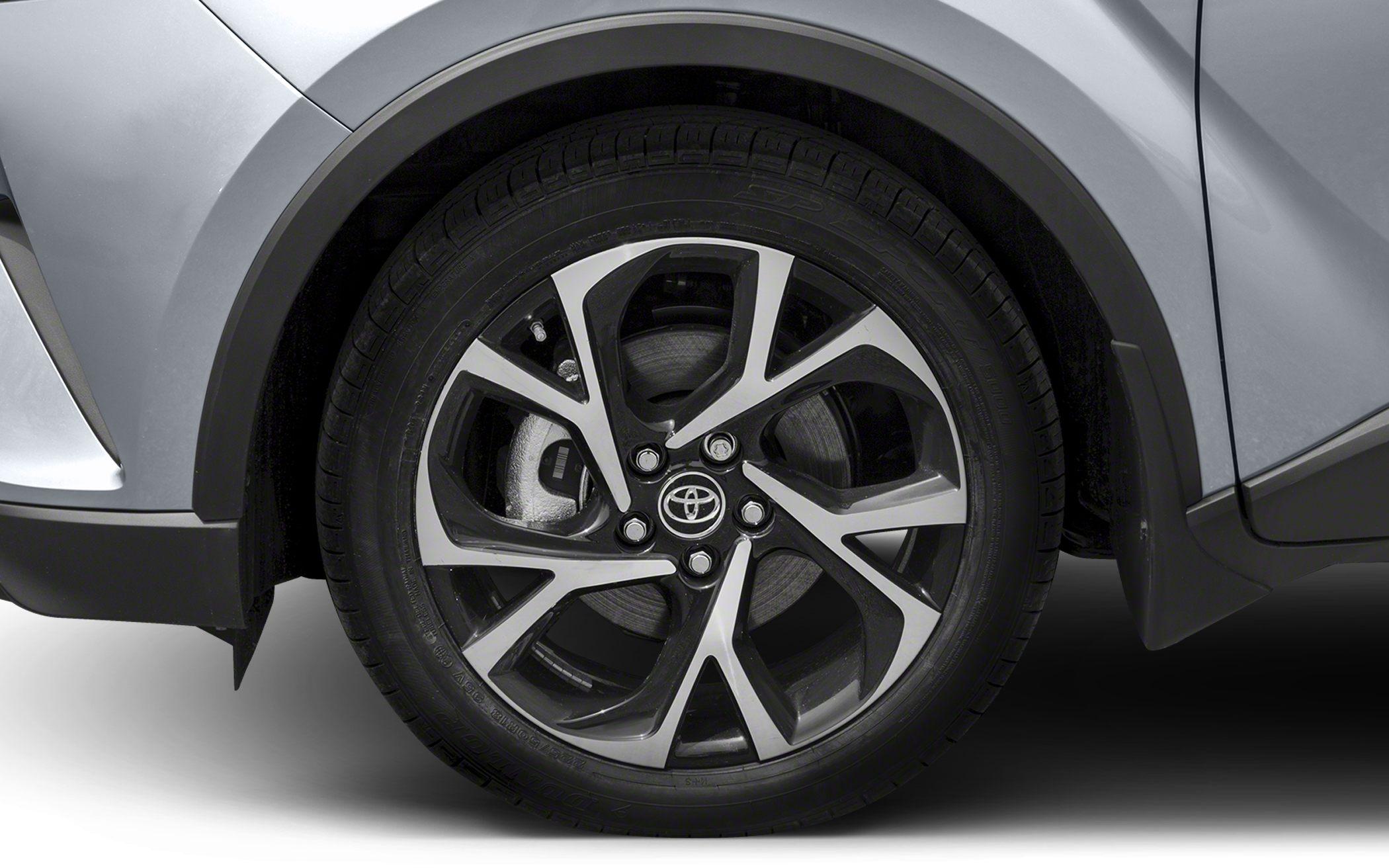 Close-up of alloy wheel with silver fender