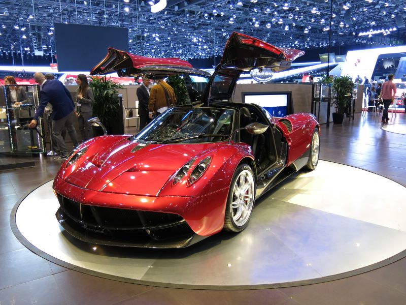 Sports car with iconic gullwing doors and sleek aerodynamics