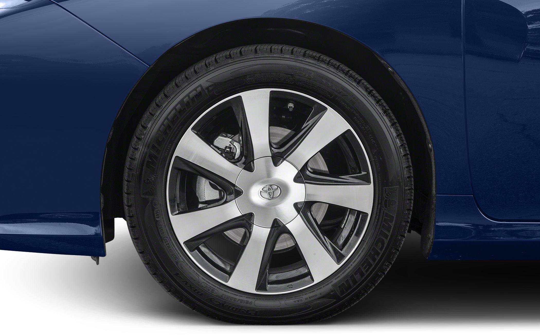 Close-up of alloy wheel with Michelin tire and Toyota emblem
