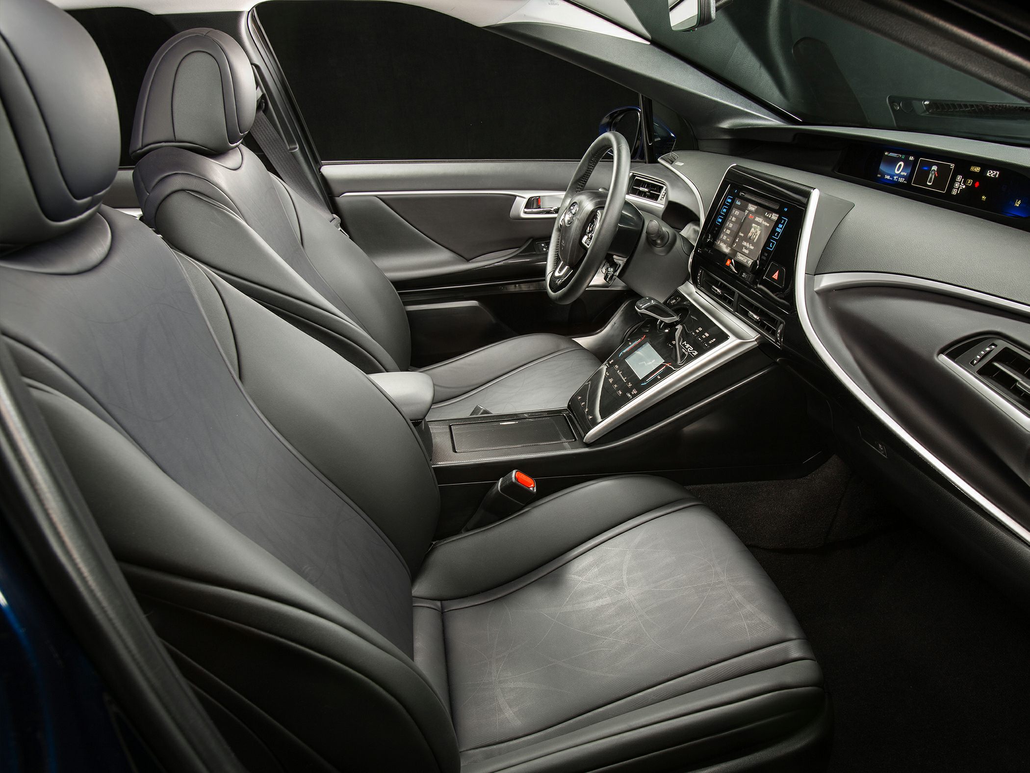 Modern car interior with leather seats and digital dashboard