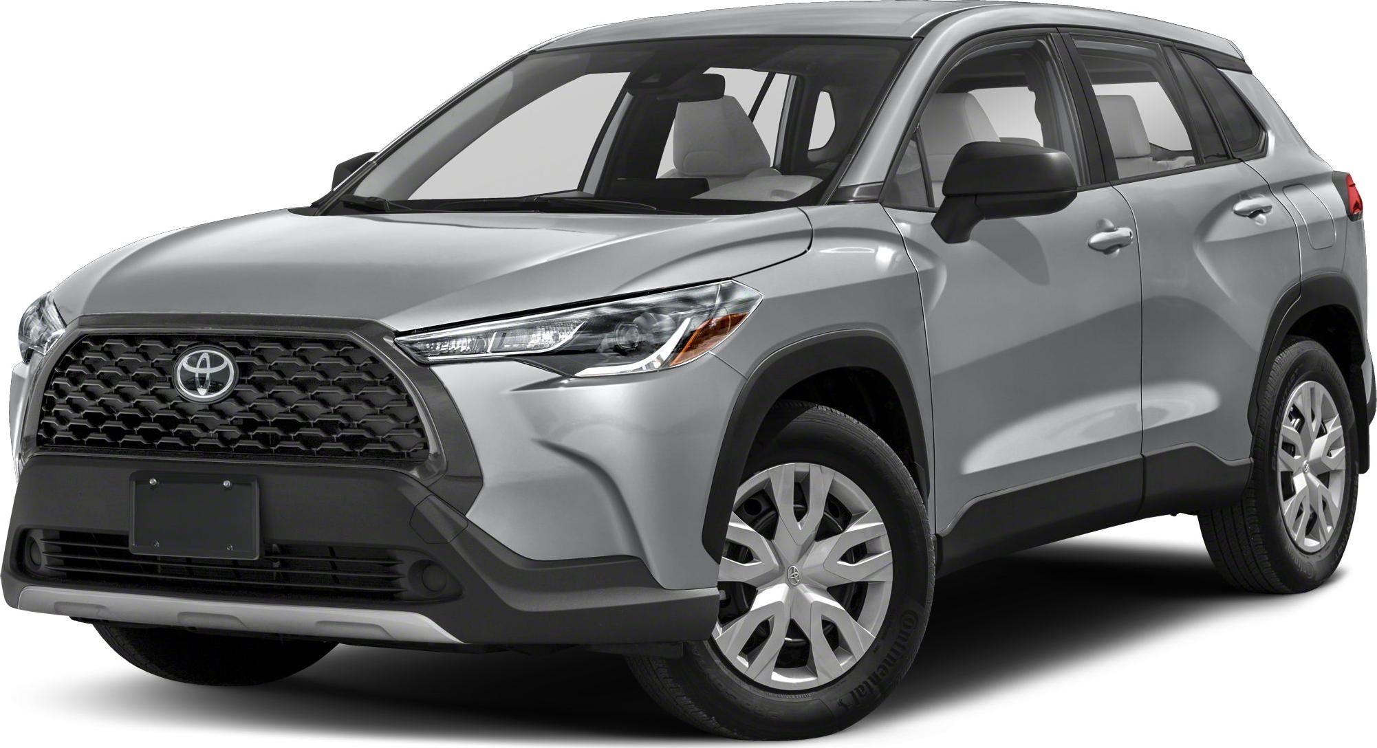 Front side view of a compact SUV with bold grille and sleek headlights