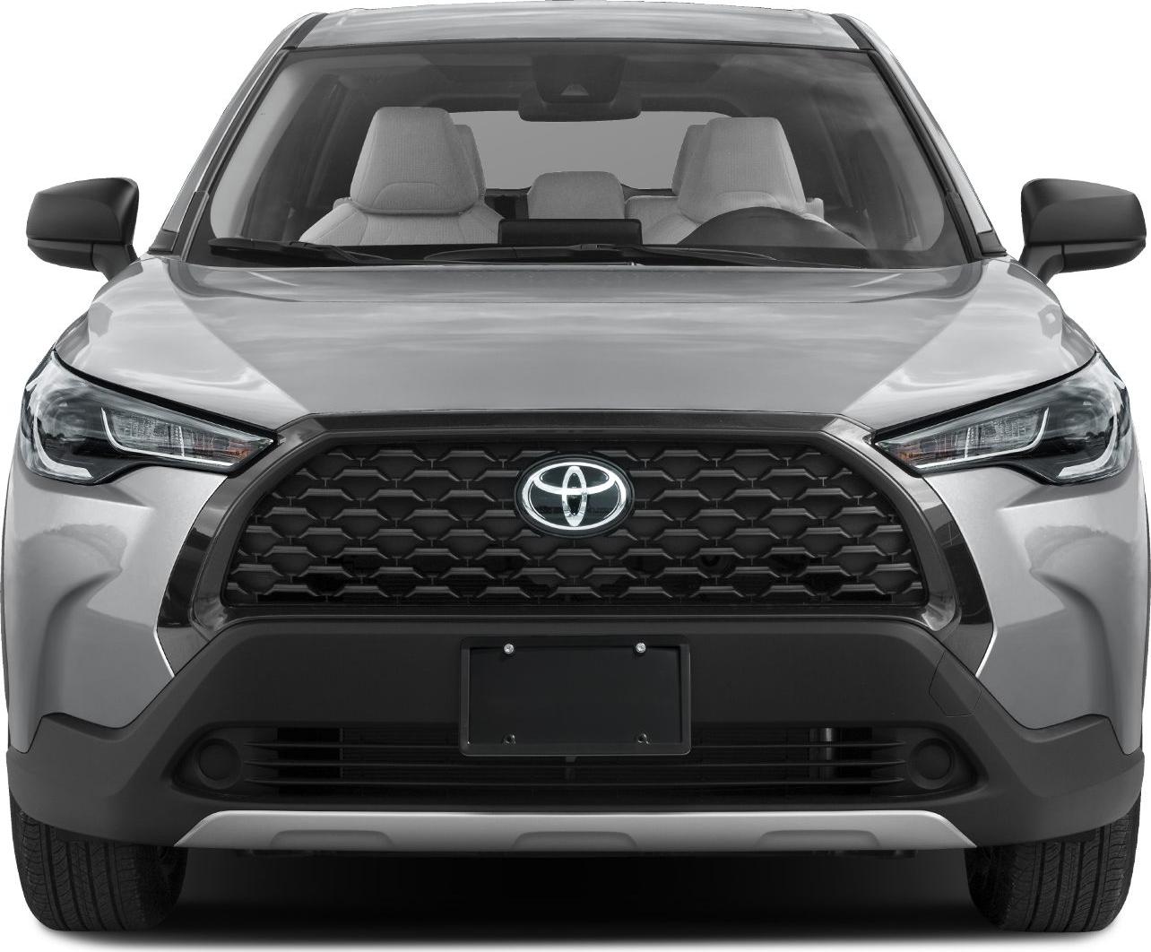 Front view with black honeycomb grille and sharp LED headlights